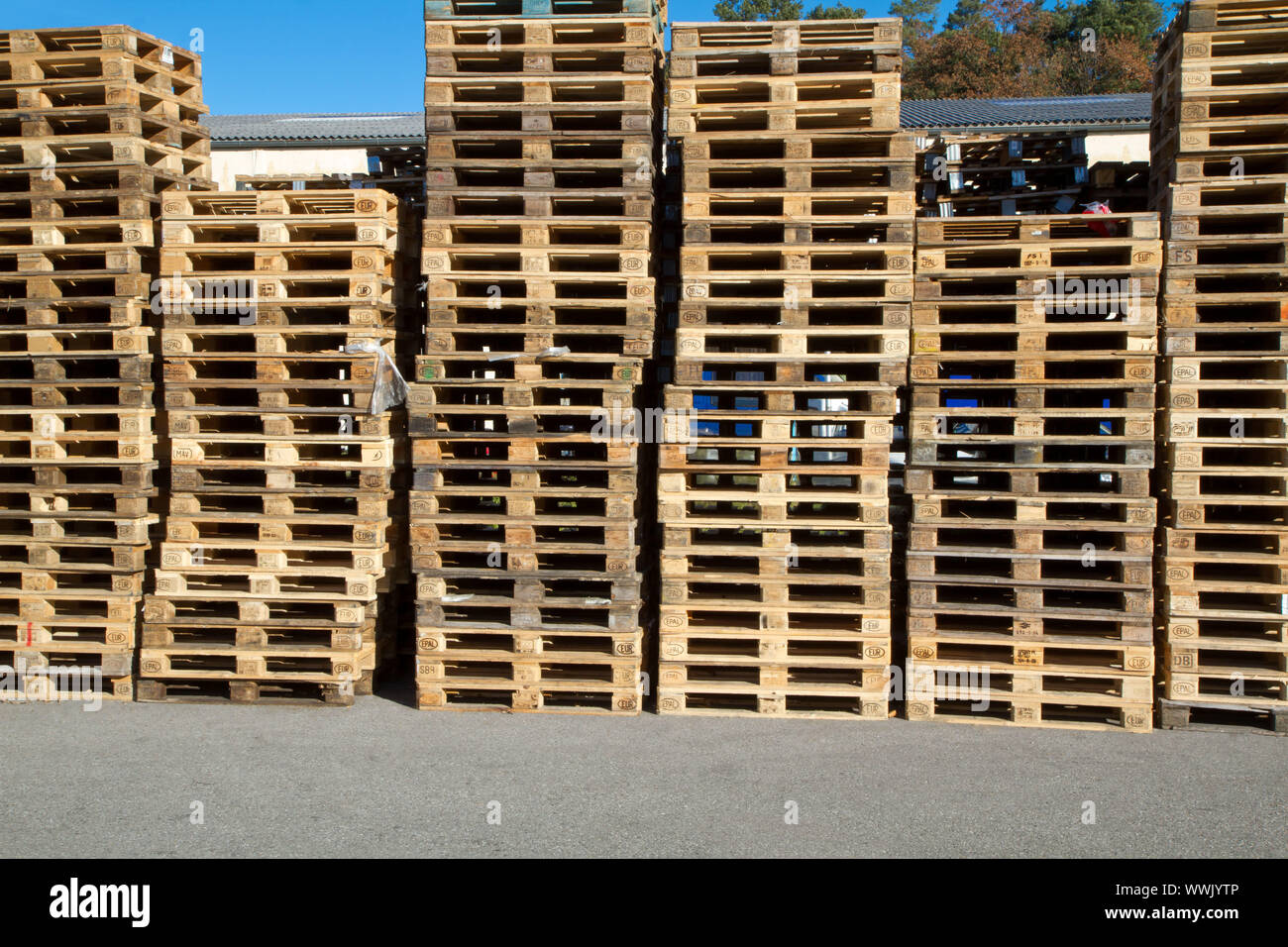 Pallets stacked on top of each other Stock Photo Alamy