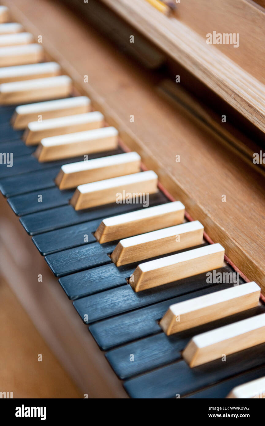 wooden church organ with black dark keyboard Stock Photo - Alamy
