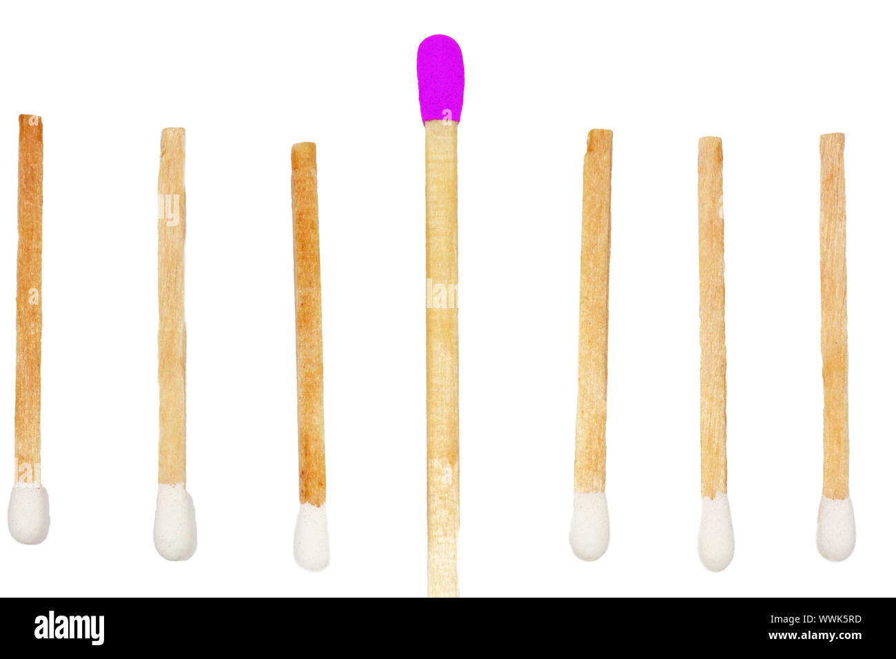 Six small matches and a big one with a different color Stock Photo - Alamy