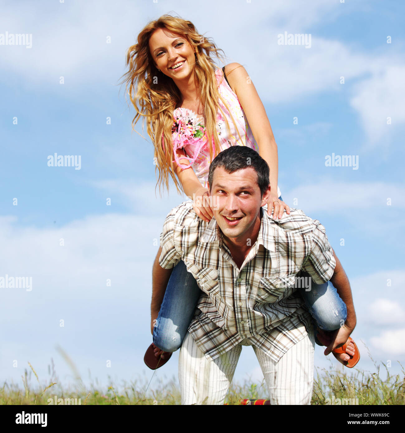 man and woman hug in the sky Stock Photo - Alamy