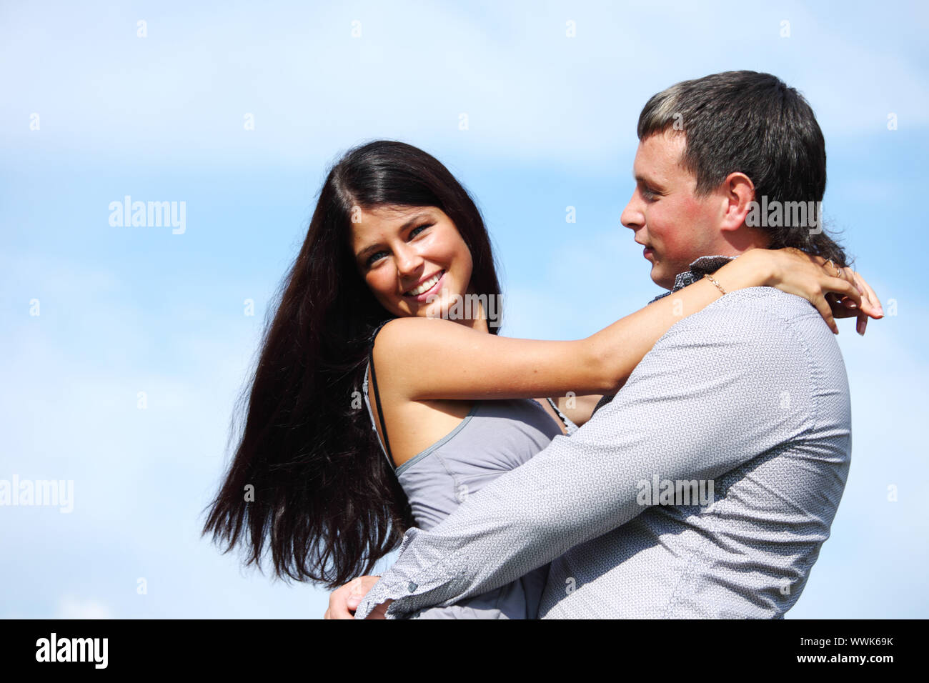 man and woman hug in the sky Stock Photo - Alamy
