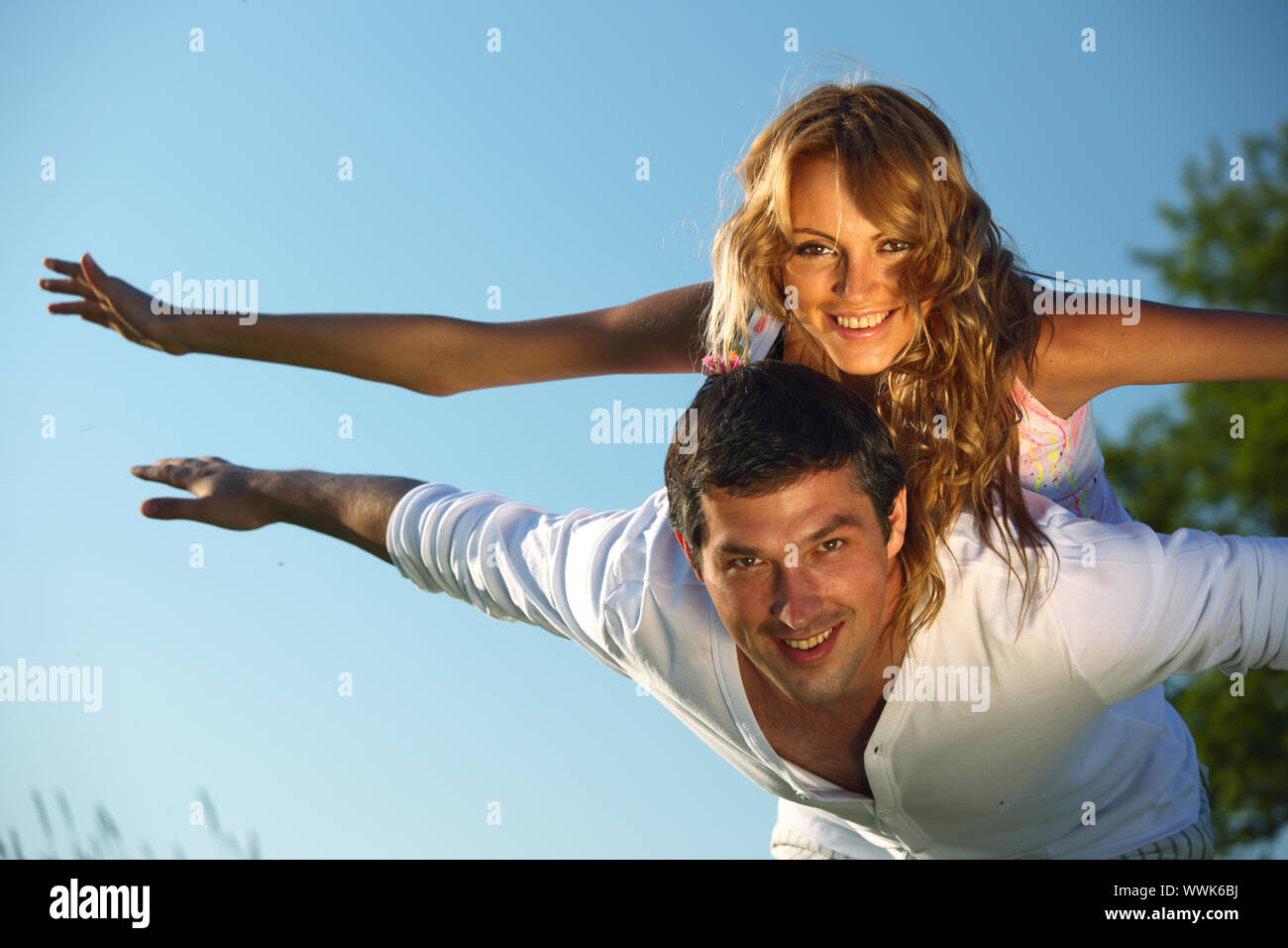 man and woman hug in the sky Stock Photo - Alamy