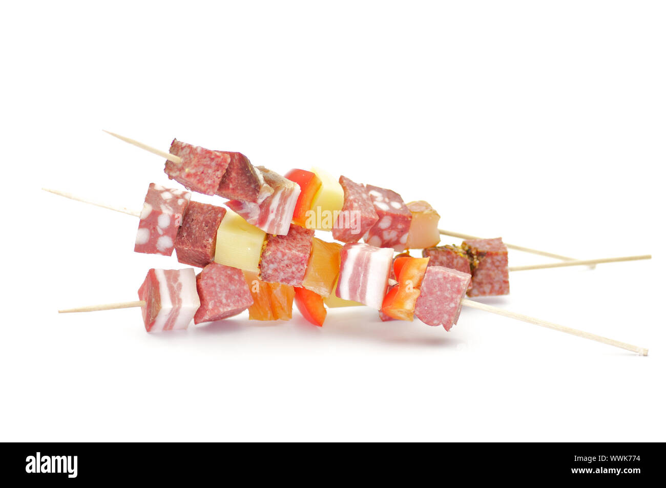 Salami Shishkabobs with red bell pepper and cheese isolated on white