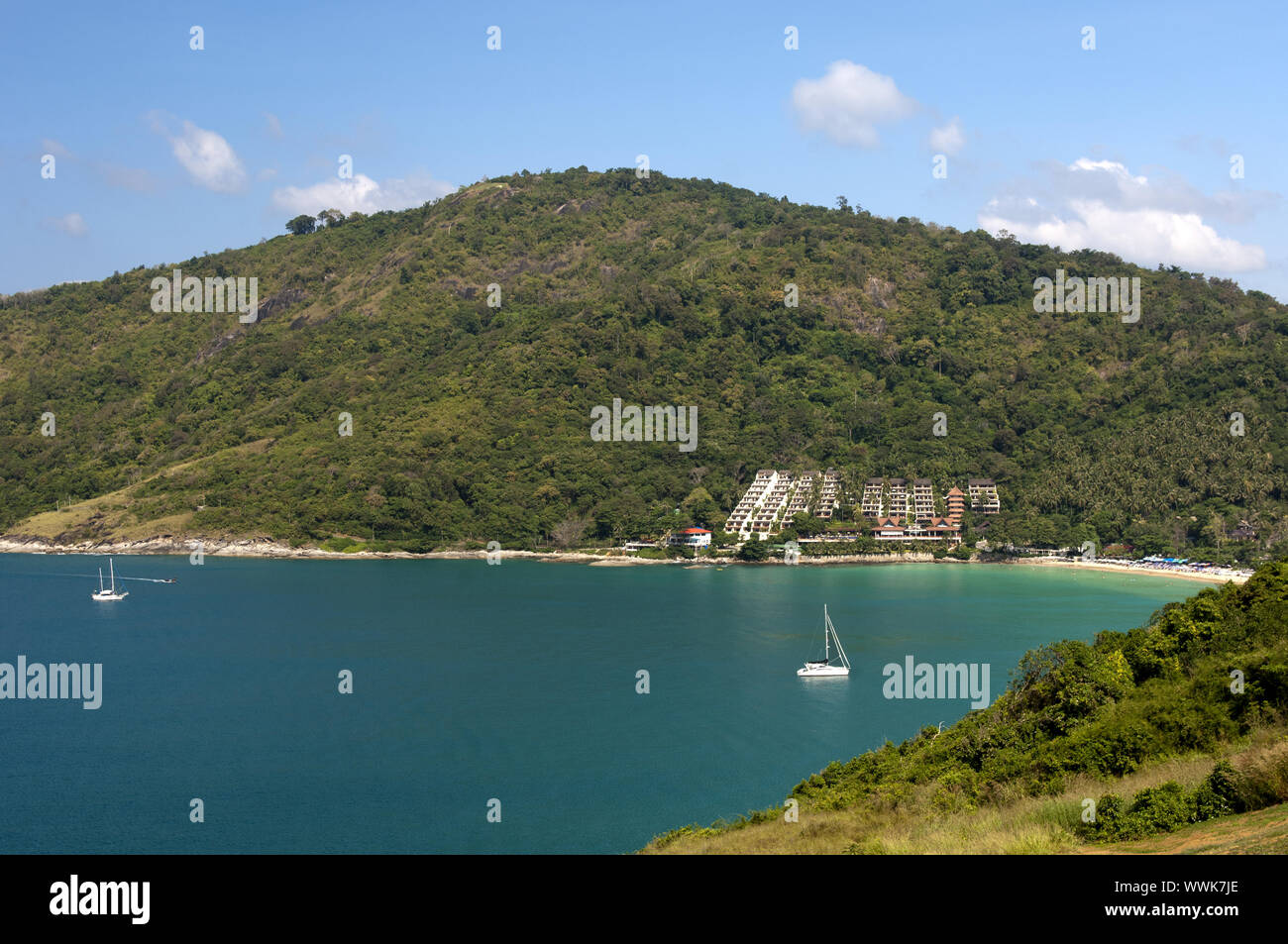 Secluded bay at Nai Harn Beach with the Royal Phuket Yacht Club Luxury Hotel in the south of the island of Phuket Stock Photo