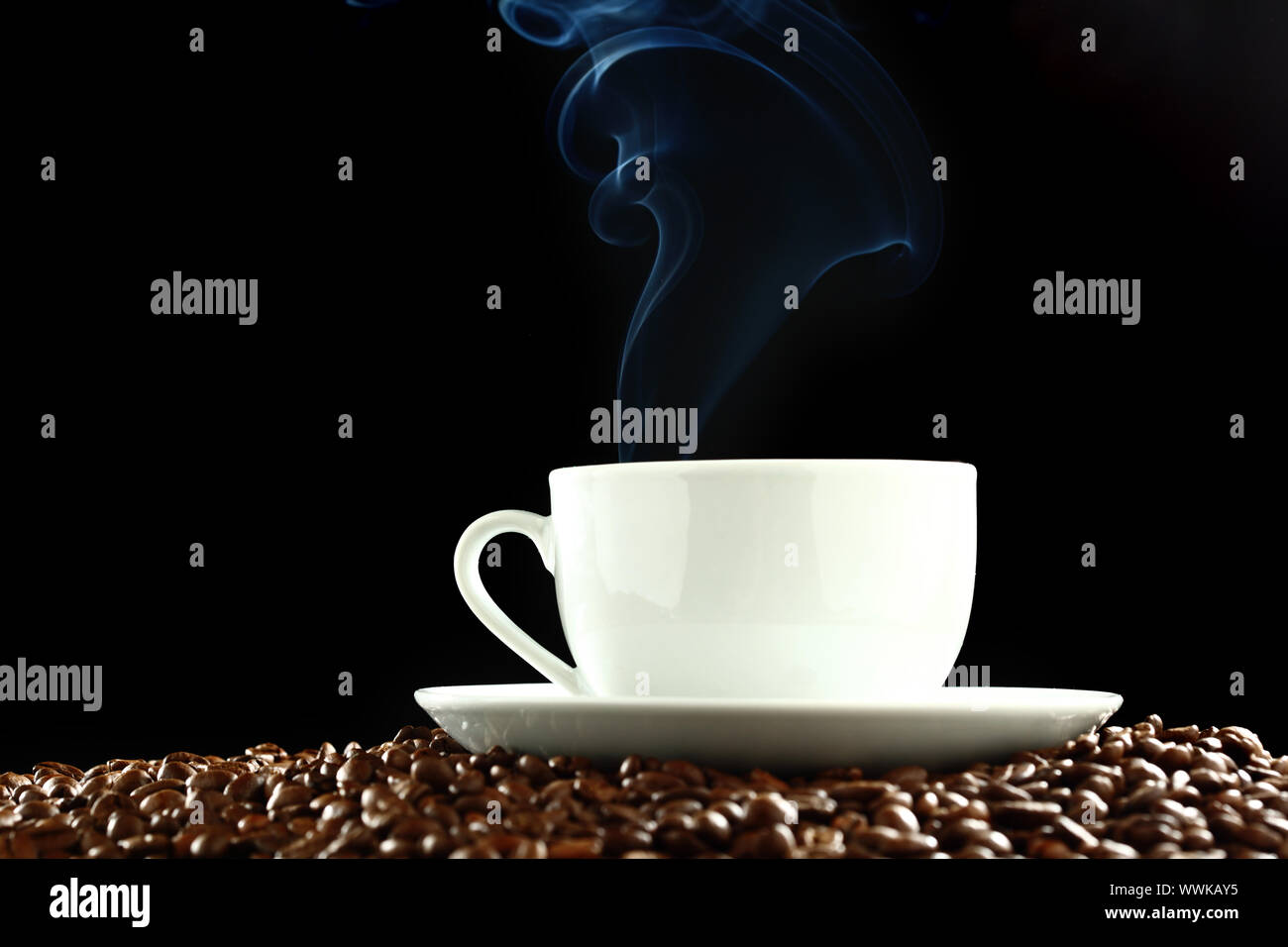 coffee background aroma and beans on black Stock Photo - Alamy