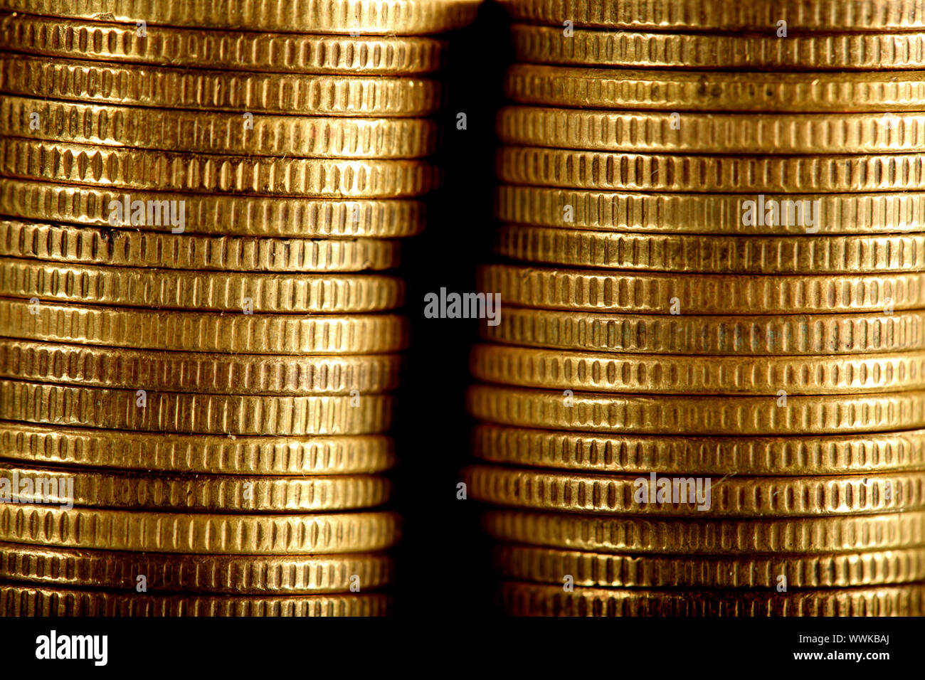 golden coins on black background Stock Photo - Alamy