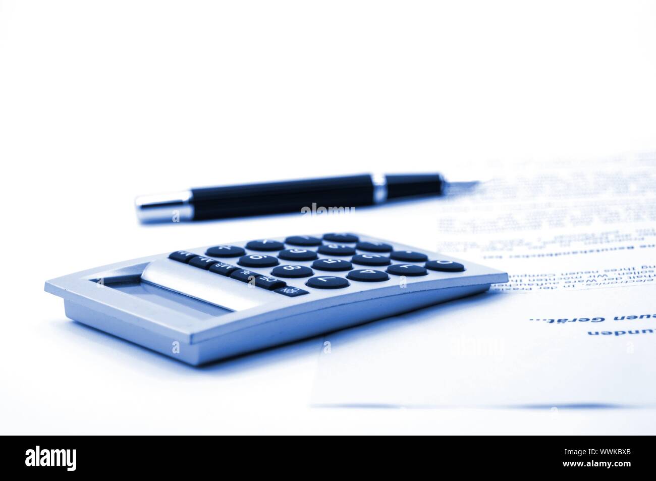 calculator and pen isolated on white background Stock Photo - Alamy