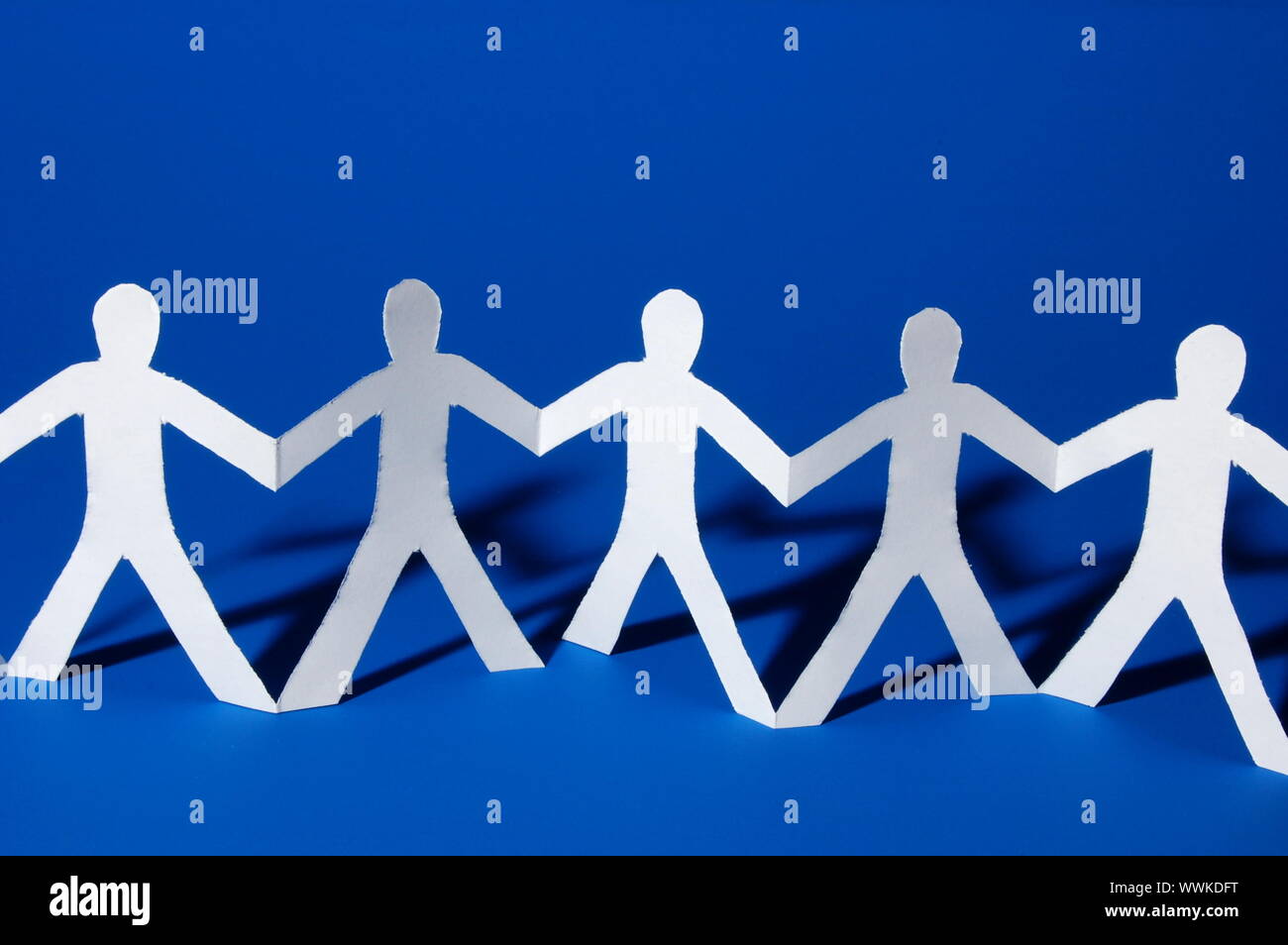 team of paper people having a party Stock Photo Alamy