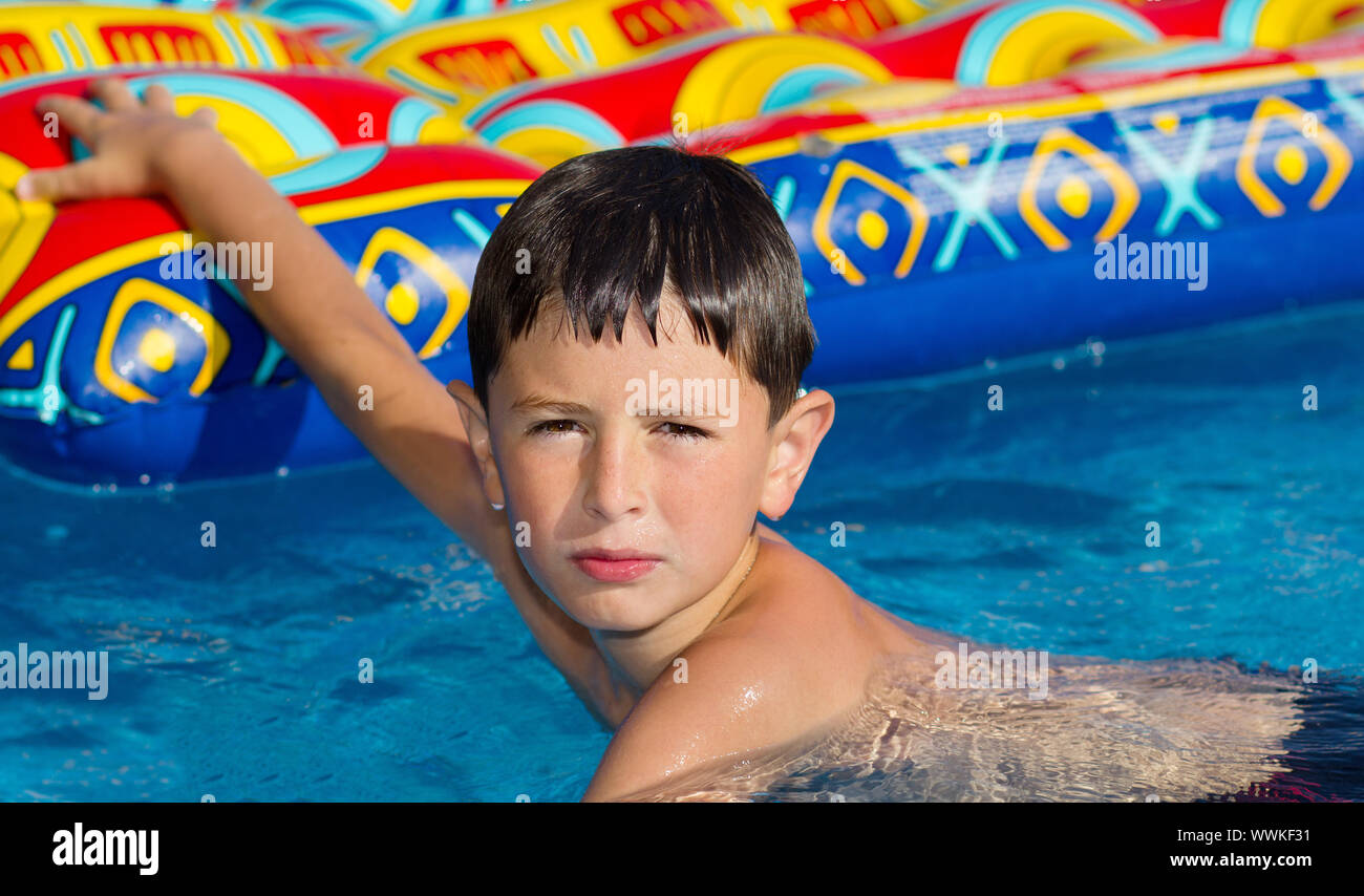 Boy in swimming pool Stock Photo Alamy