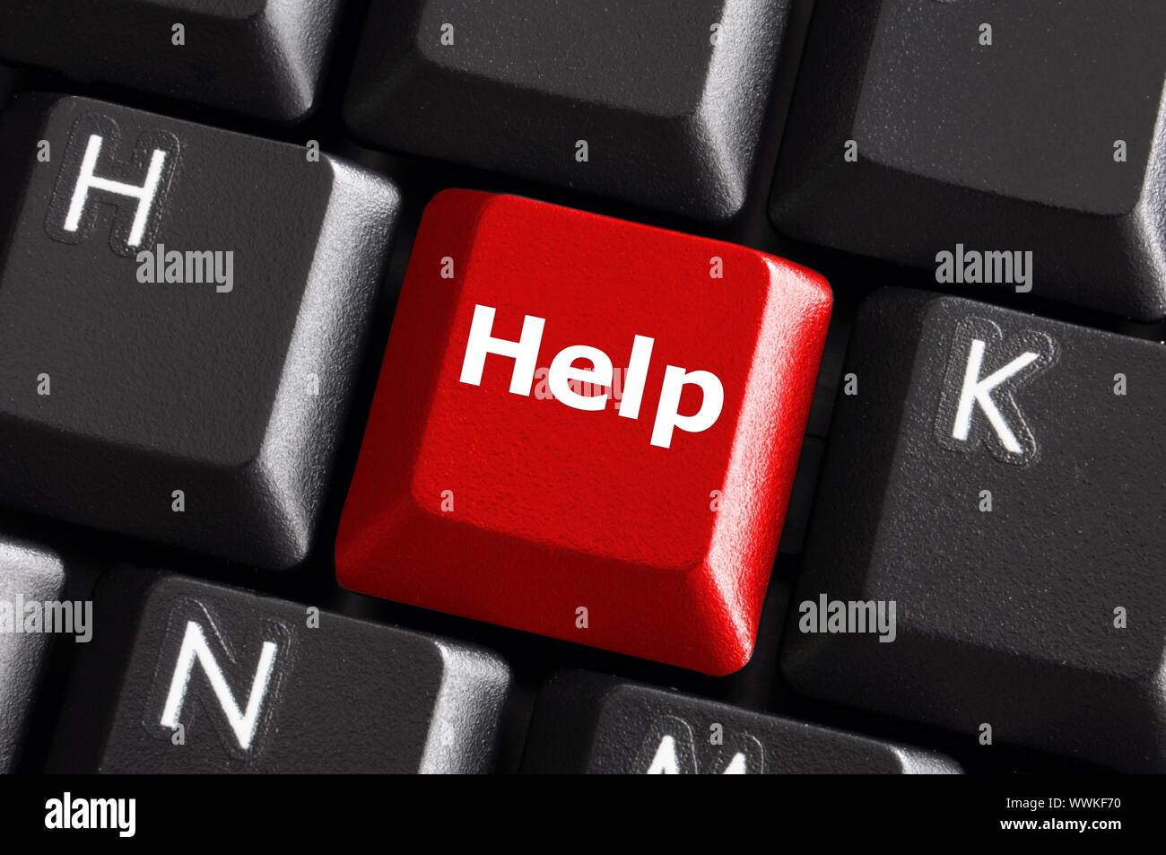 help support or assistance concept with red button on computer keyboard Stock Photo