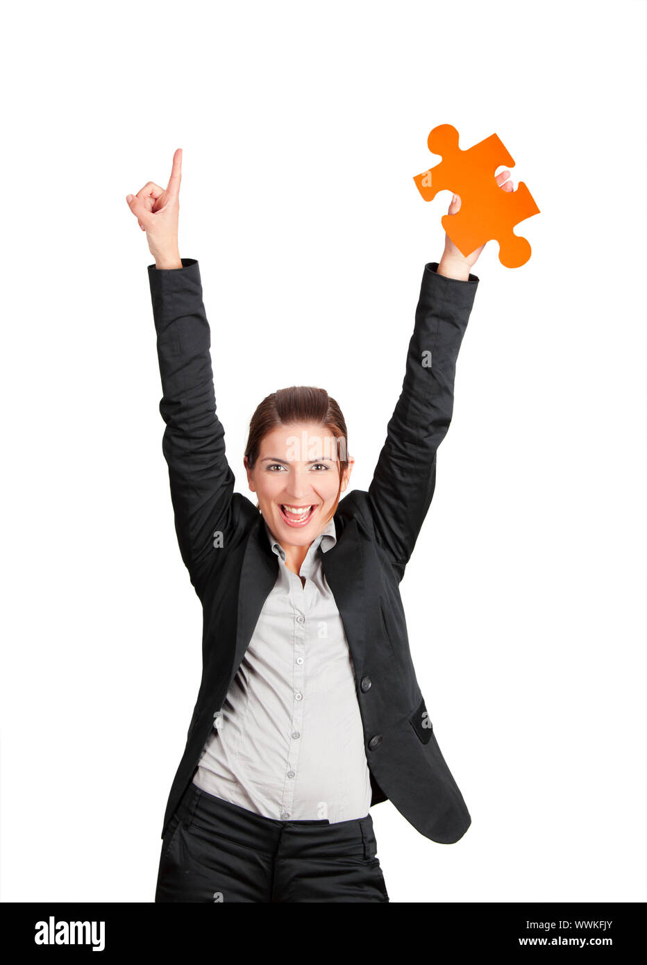 Happy business woman holding a big piece of puzzle, isolated on white ...