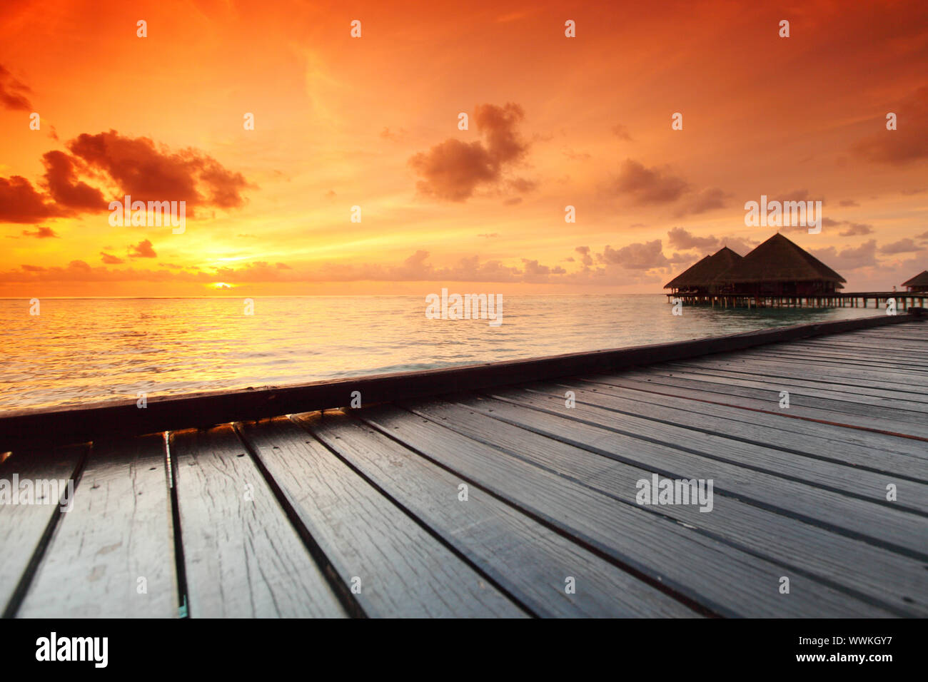 resort maldivian houses on sunrise Stock Photo - Alamy