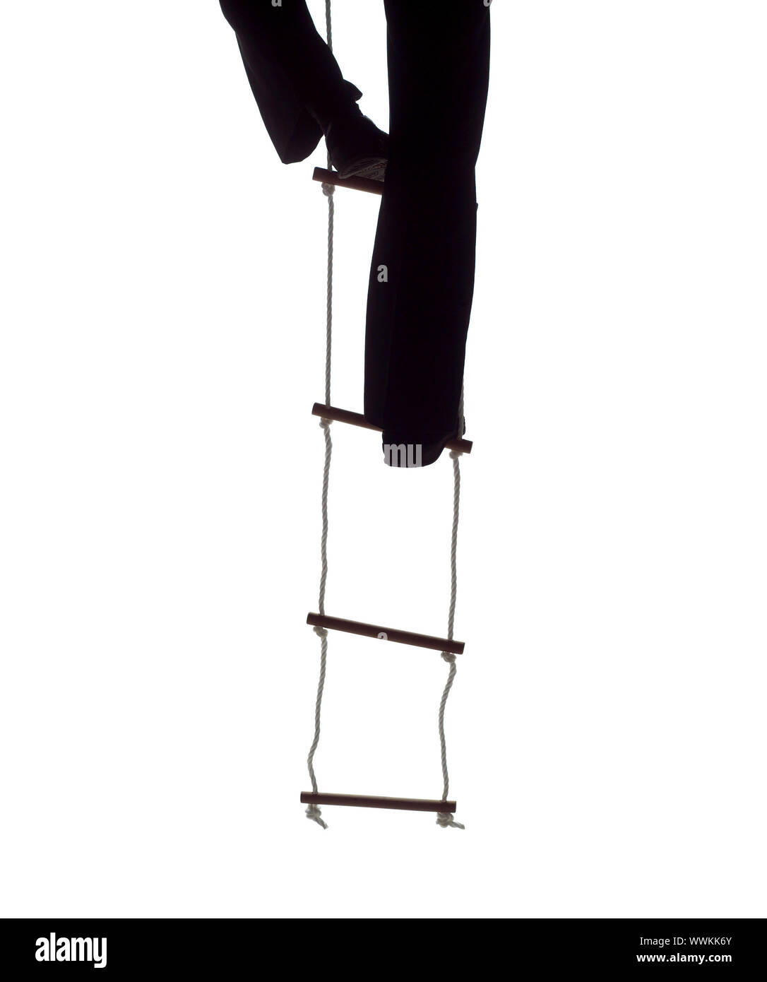 Climbing up the Rope Ladder Stock Photo Alamy