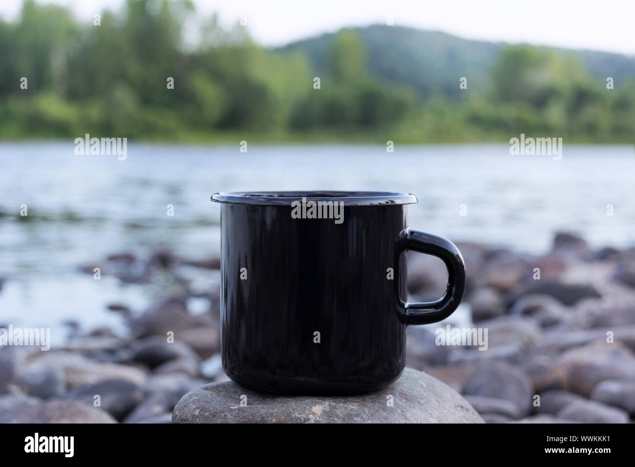 Download Black Campfire Enamel Coffee Mug Mockup With Stony River Bank Empty Mug Mock Up For Design Promotion Stock Photo Alamy