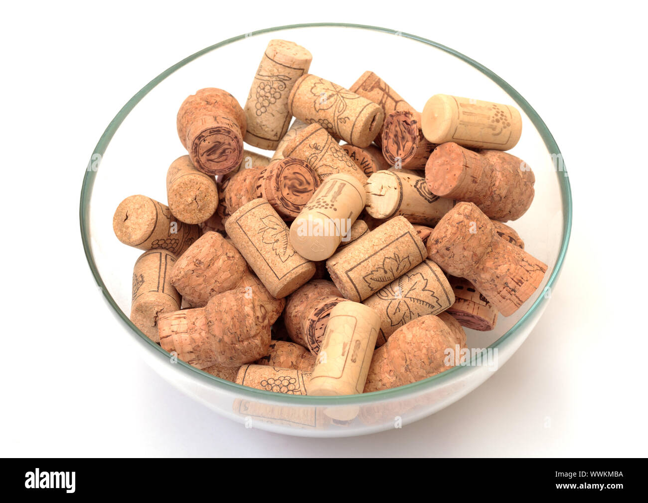 wine corks in bowl on white Stock Photo Alamy