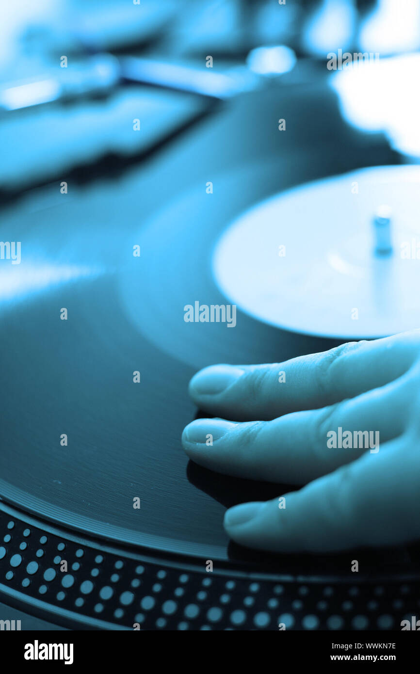 scratch battle of dj playing on his vinyls hand on Stock Photo Alamy
