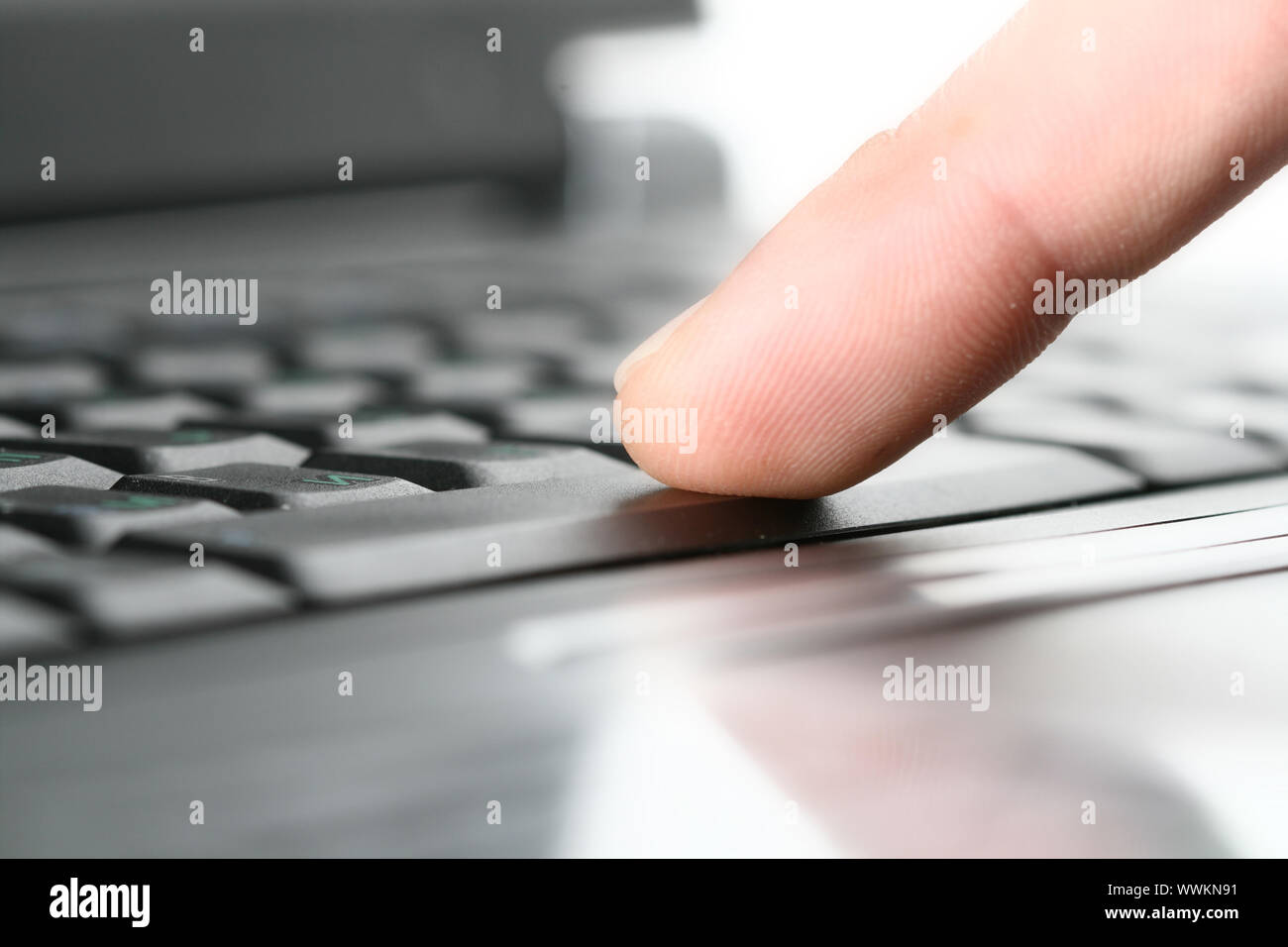 finger press notebook button concept Stock Photo - Alamy