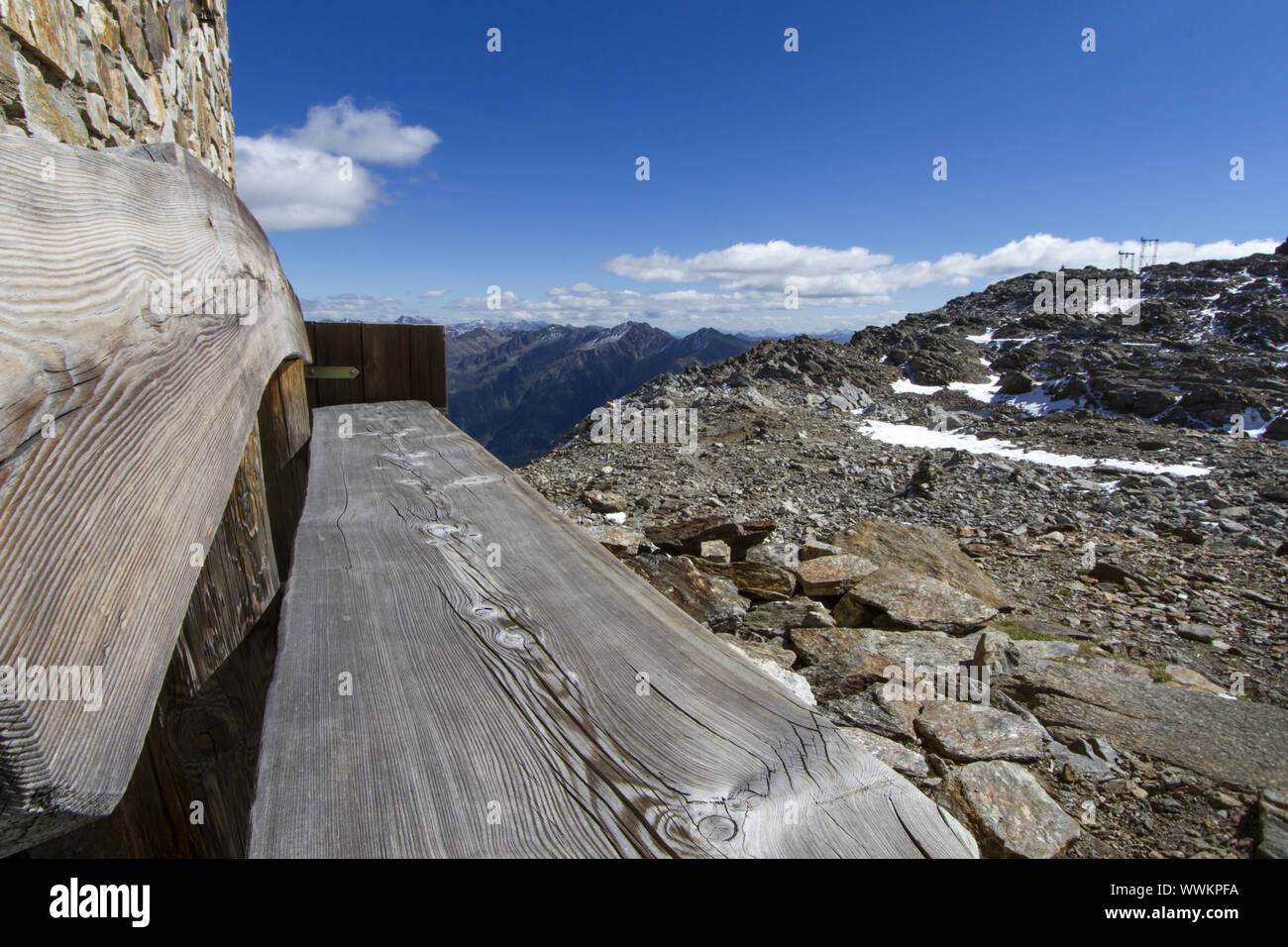 Close-up of a bench in the South Tyrolean Alps in summer Stock Photo