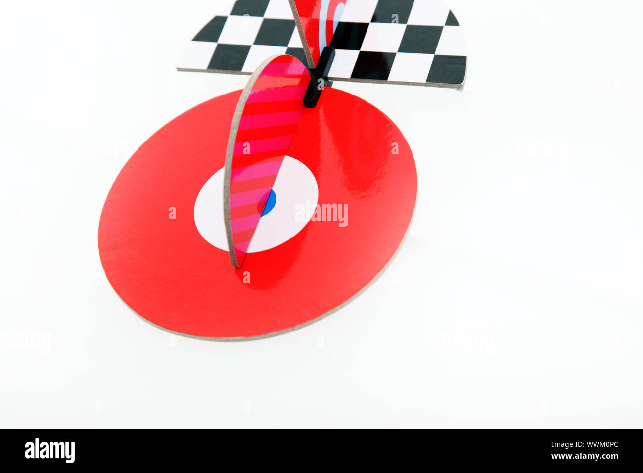 Colourful home-made object constructed using different geometric shapes ...