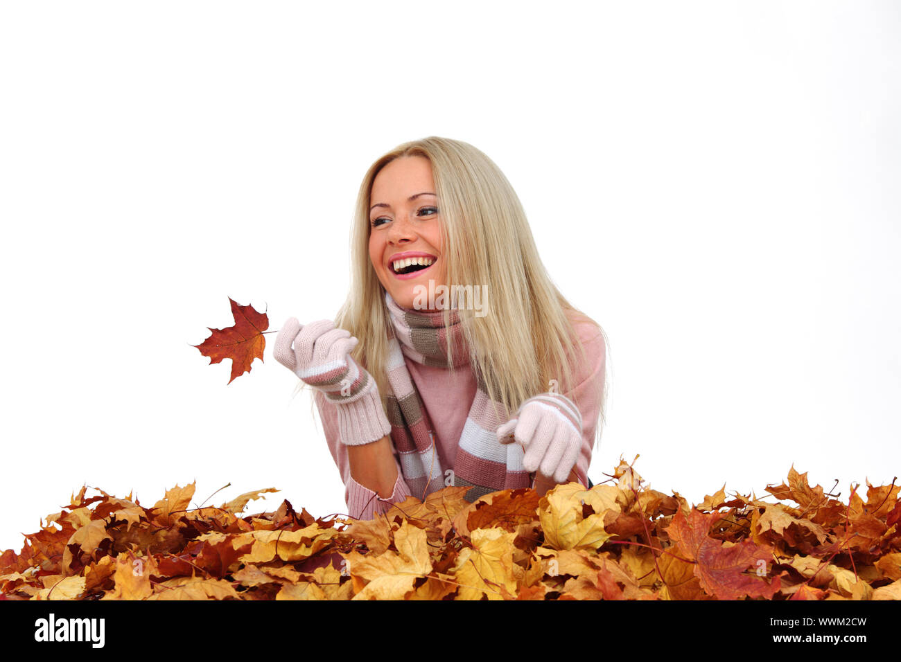 studio portrait of autumn woman in yellow leaves Stock Photo - Alamy