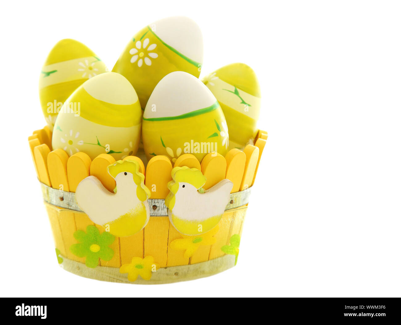 Easter eggs in the basket isolated on white background Stock Photo - Alamy