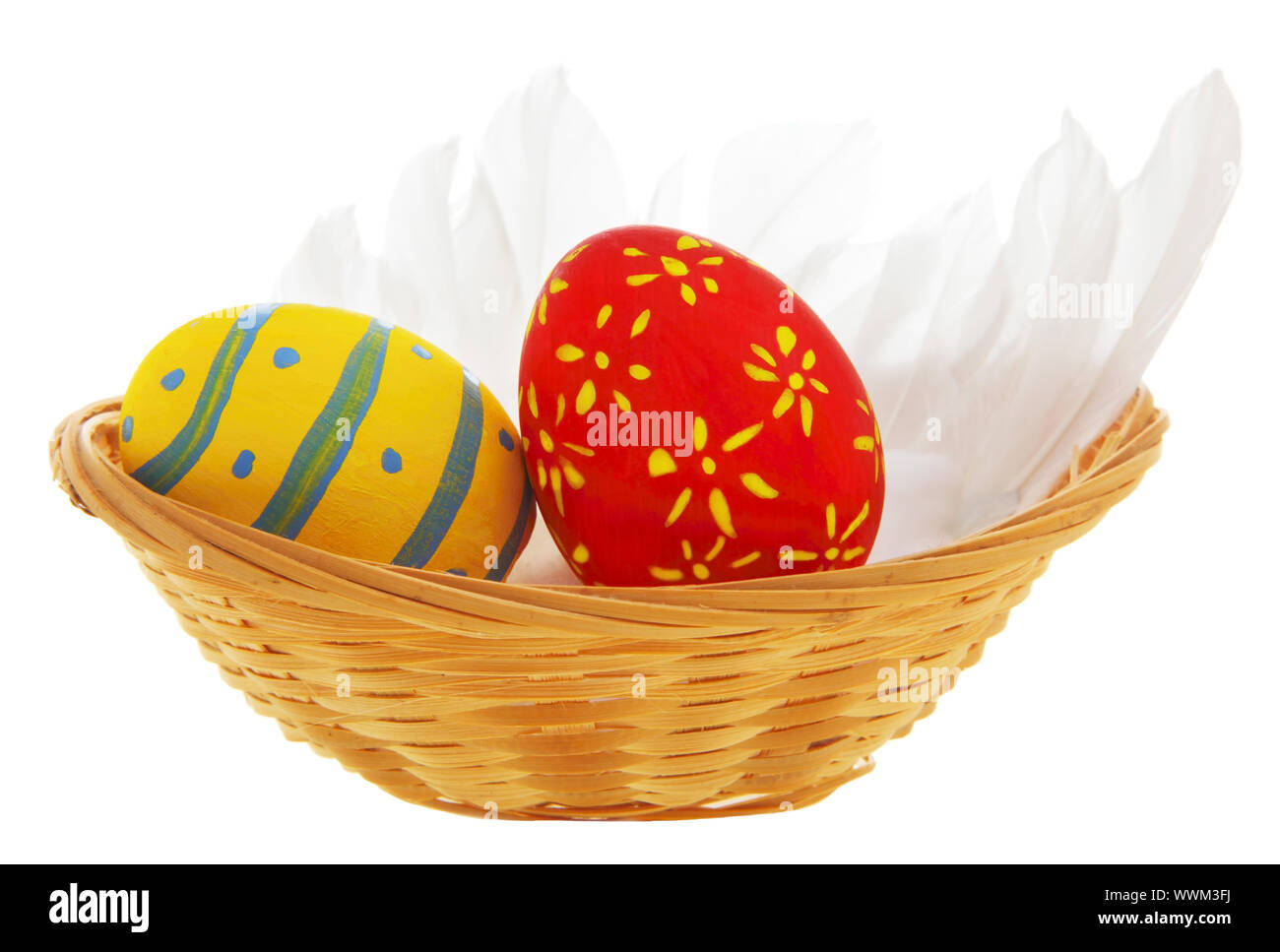 Easter eggs in the basket isolated on white background Stock Photo - Alamy