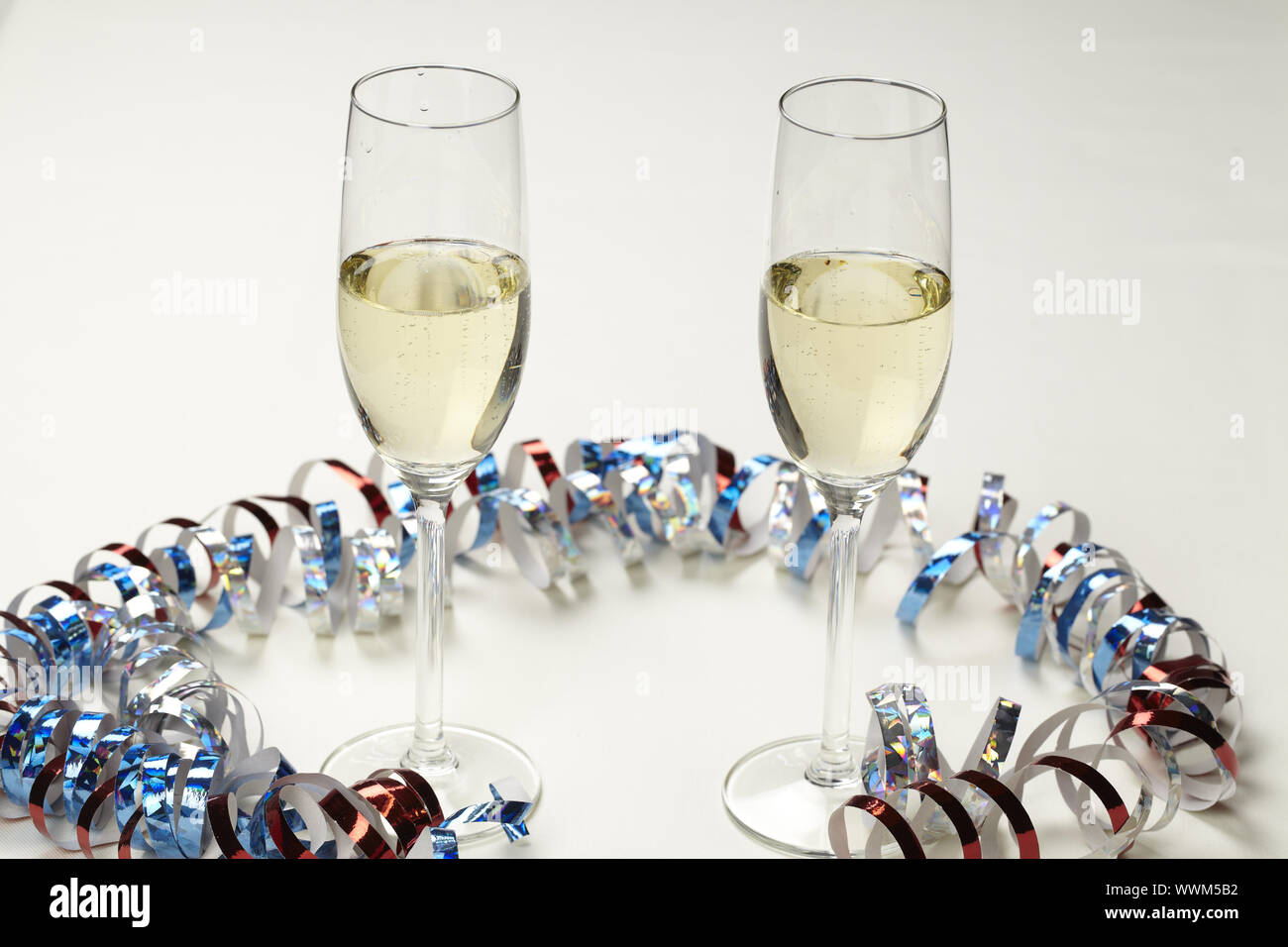 Champagne with streamers Stock Photo - Alamy