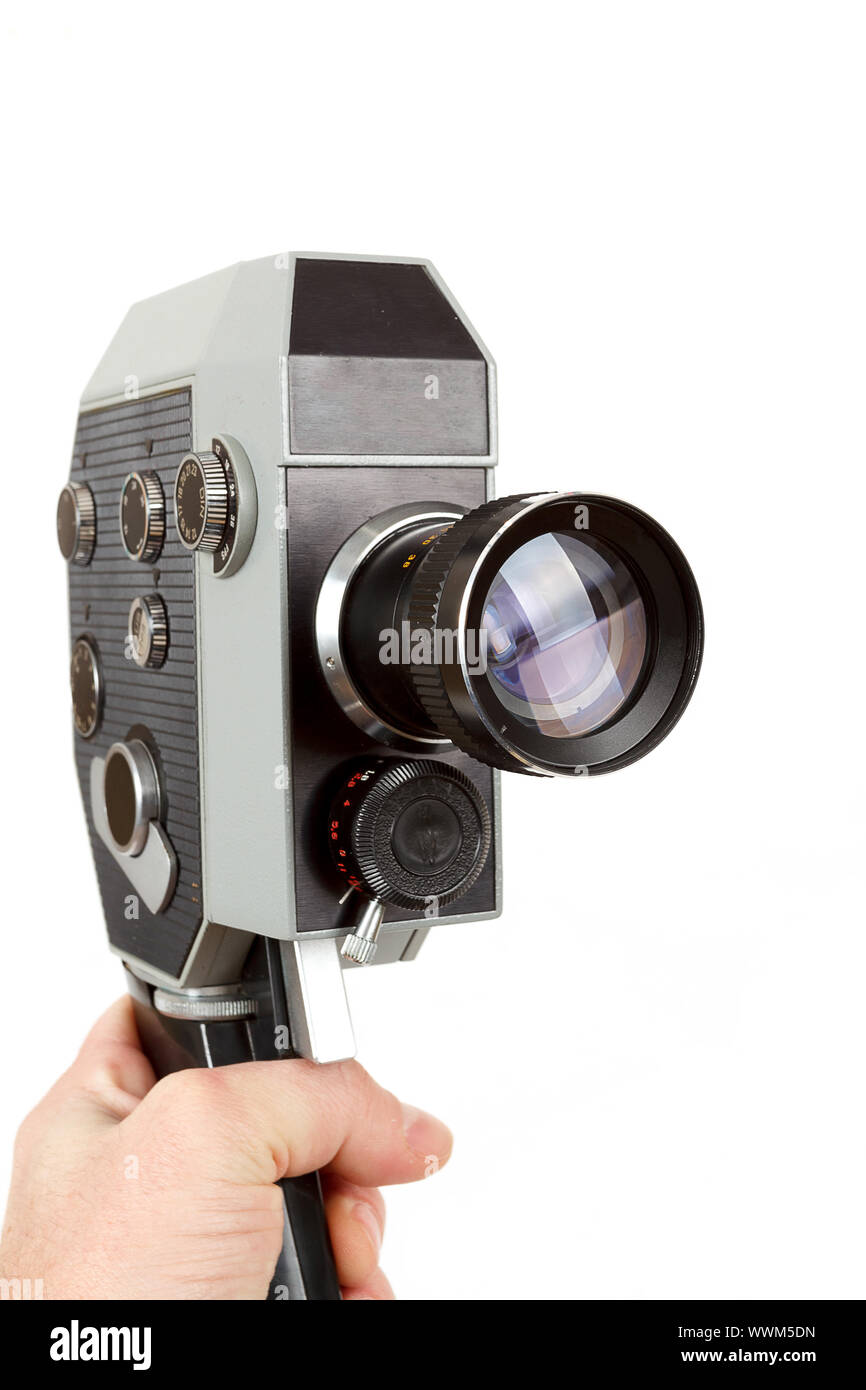 Old 8mm movie camera in hand Stock Photo - Alamy