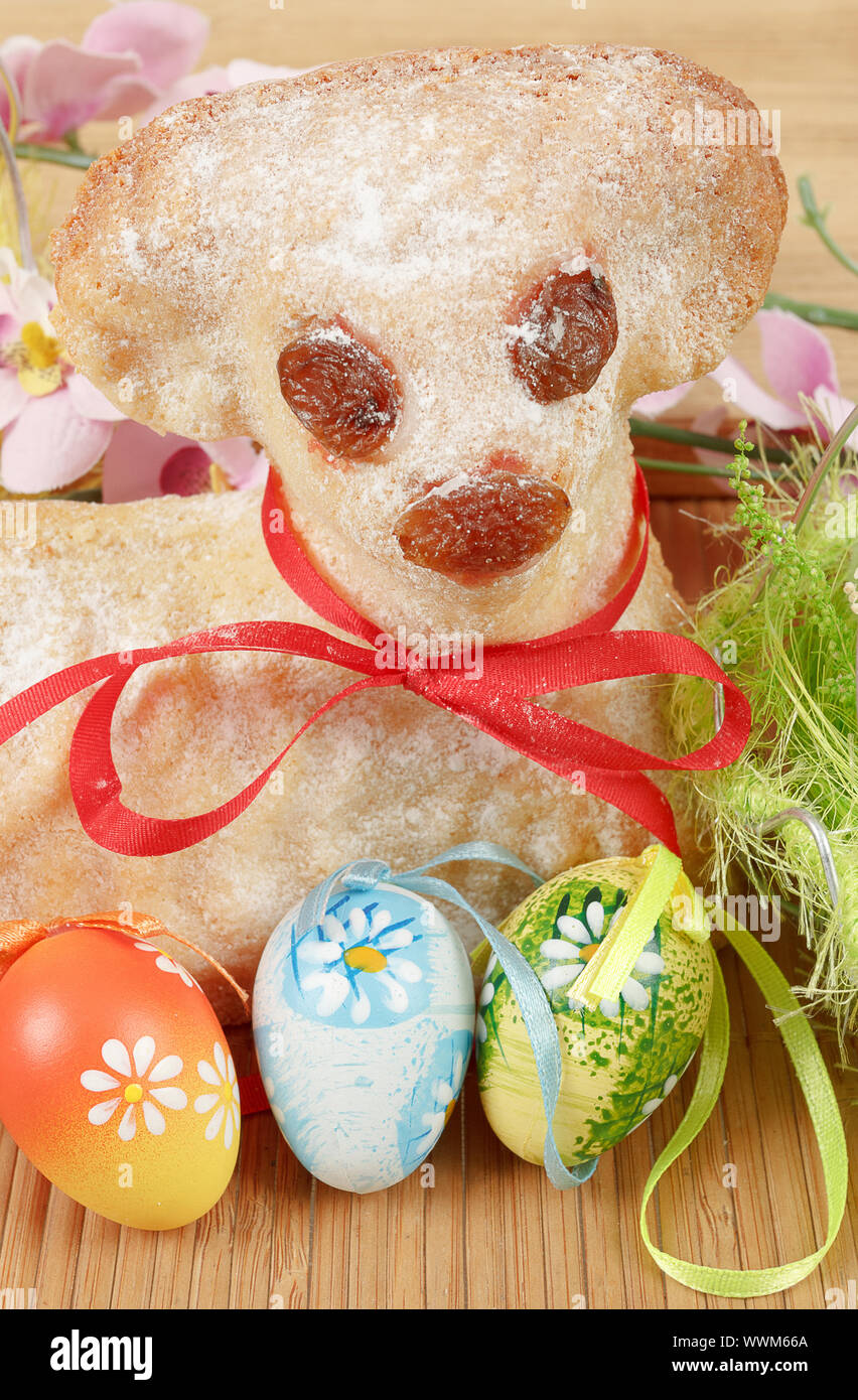 Easter lamb with painted eggs Stock Photo