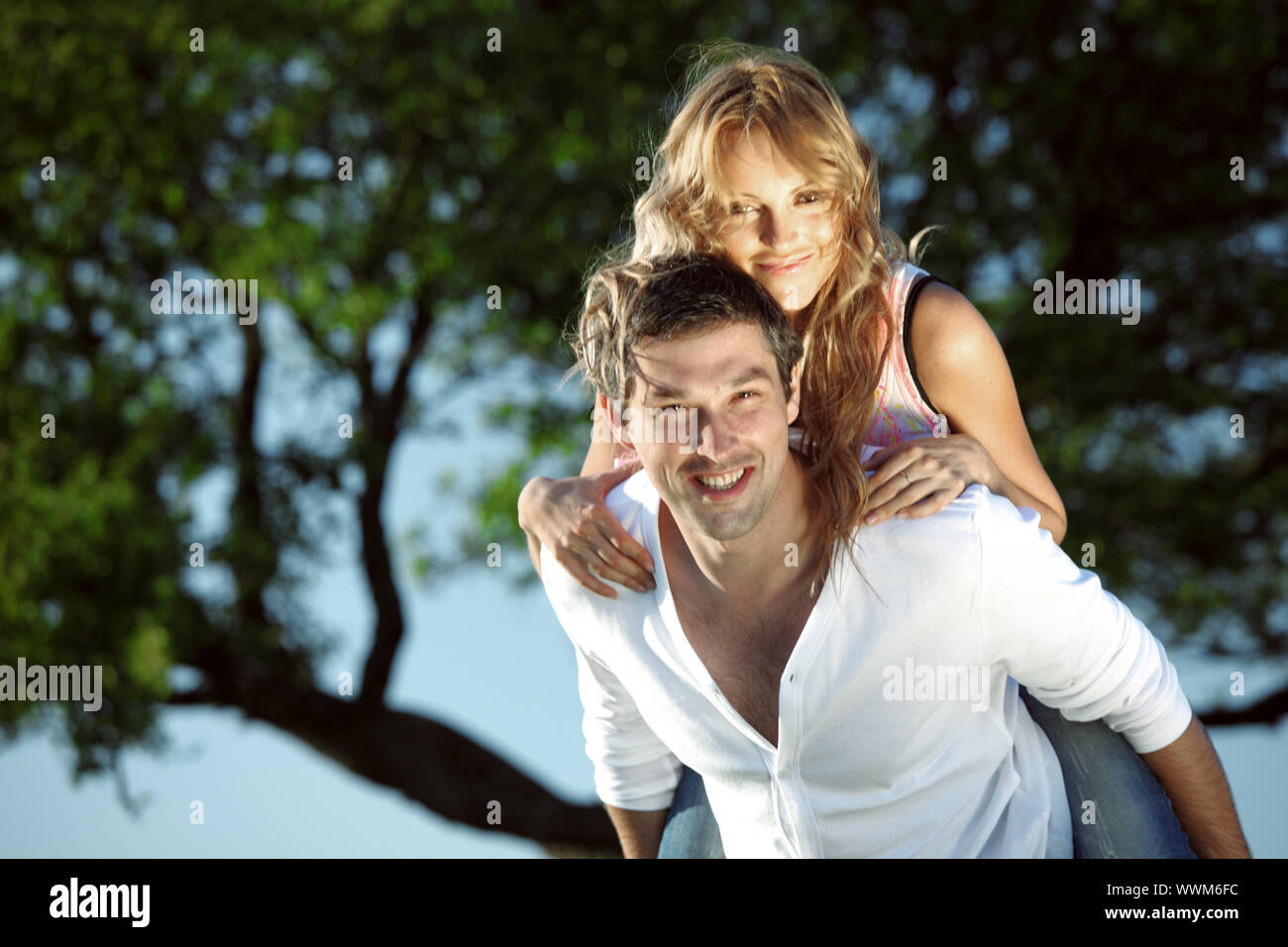 man and woman hug in the sky Stock Photo - Alamy