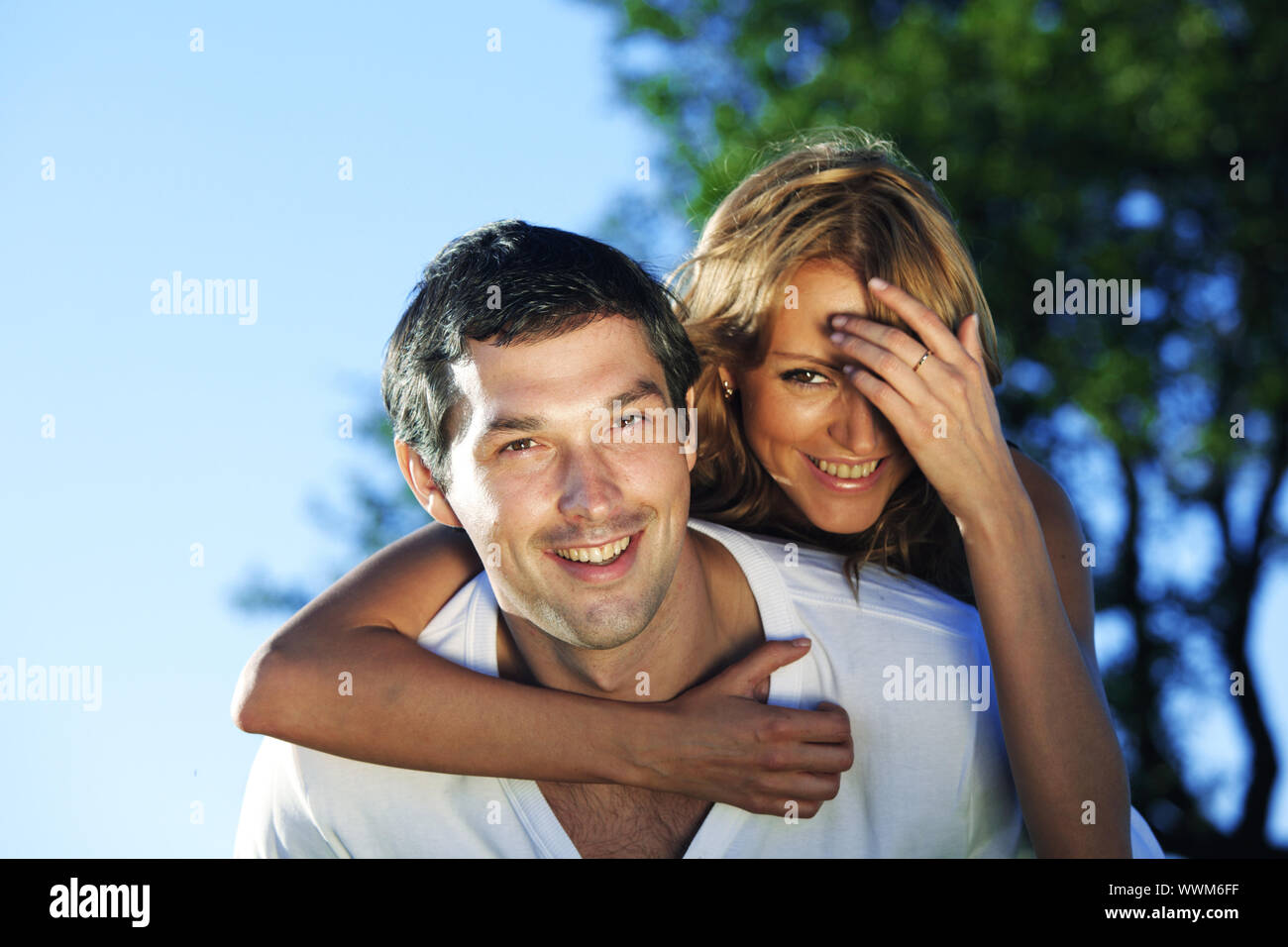 man and woman hug in the sky Stock Photo - Alamy