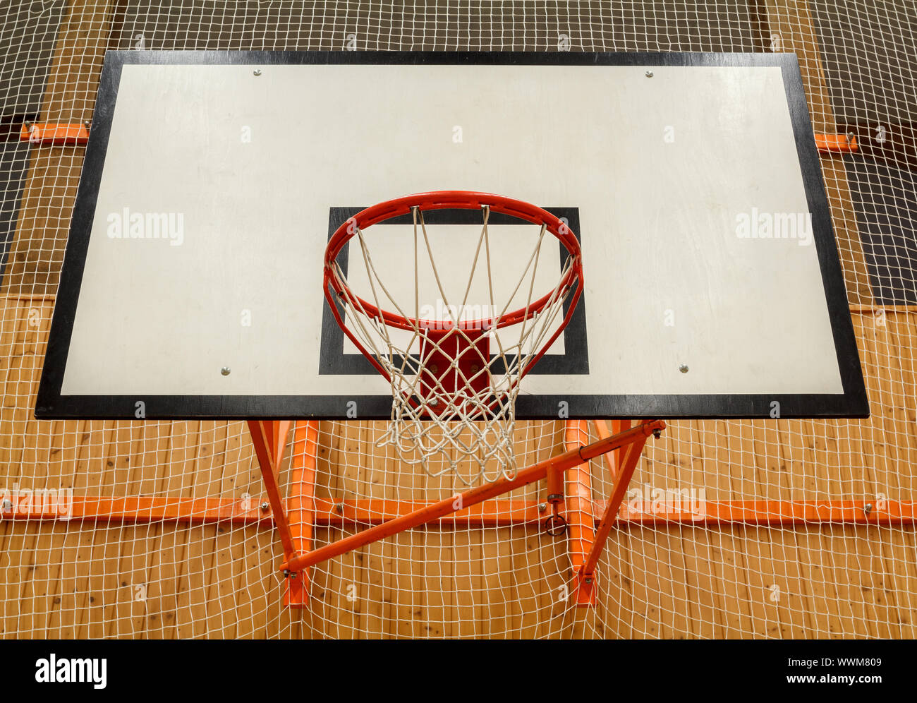 Basketball hoop cage in public gym Stock Photo Alamy