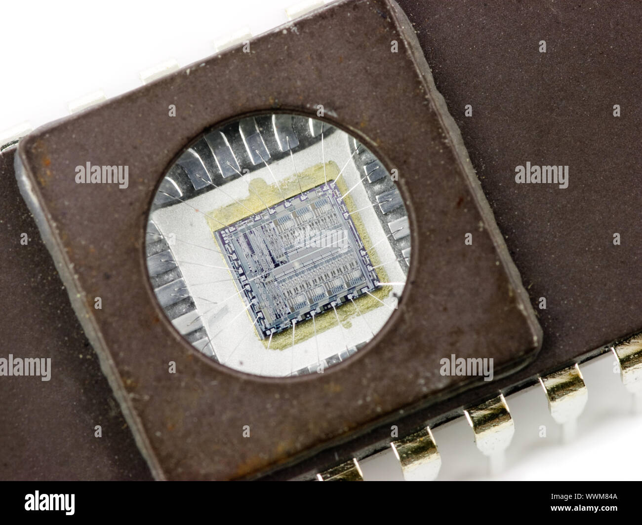 EPROM memory microchip with a transparent window, showing the integrated circuit inside Stock Photo