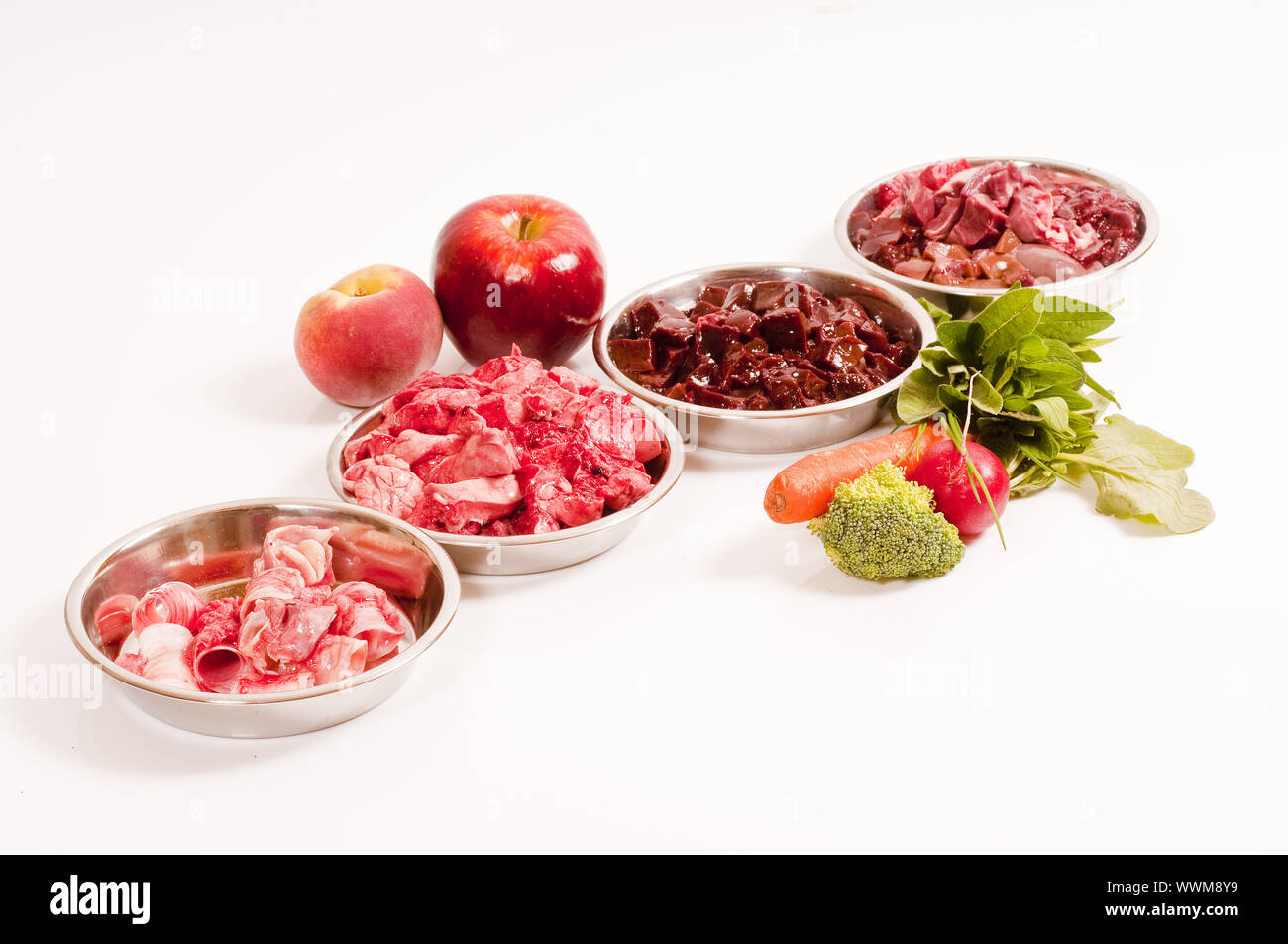 Barf: raw meat with vegetable and fruit portions, ready-prepared Stock Photo