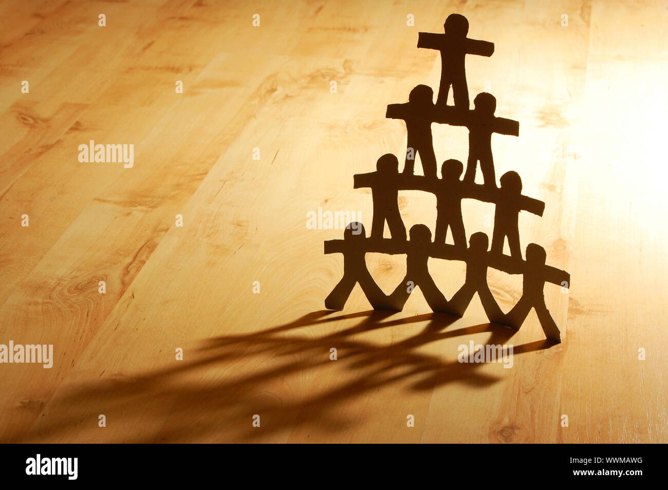 team of paper people showing concept of teamwork Stock Photo Alamy