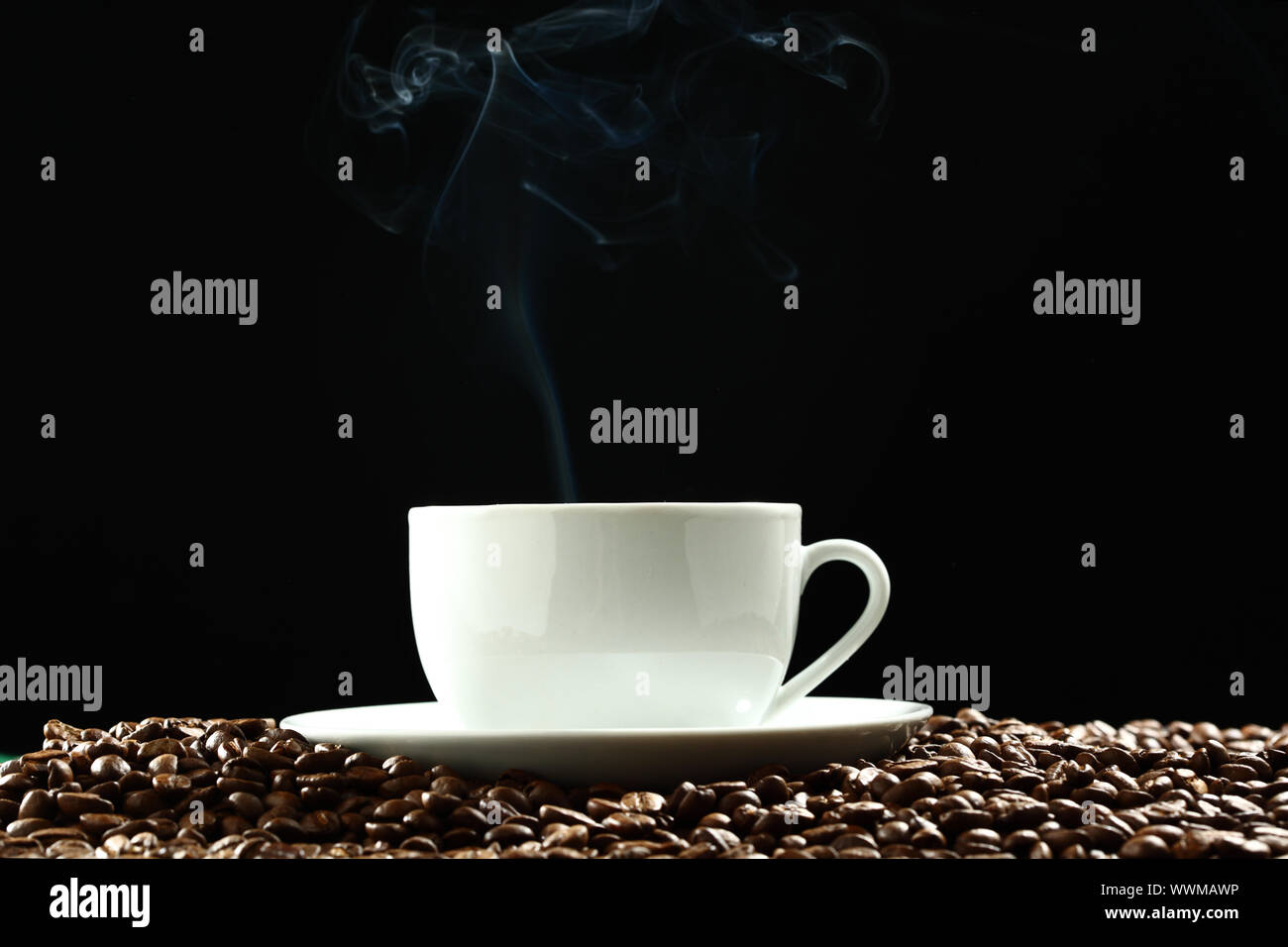 coffee background aroma and beans on black Stock Photo - Alamy