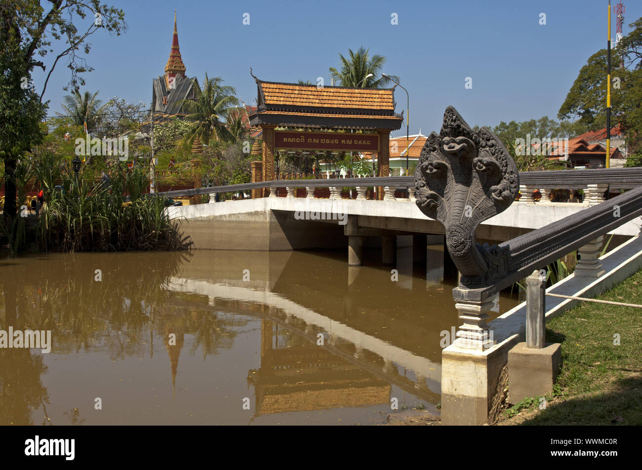 Bridge with five-headed Naga snake across the Siem Reap River Stock Photo