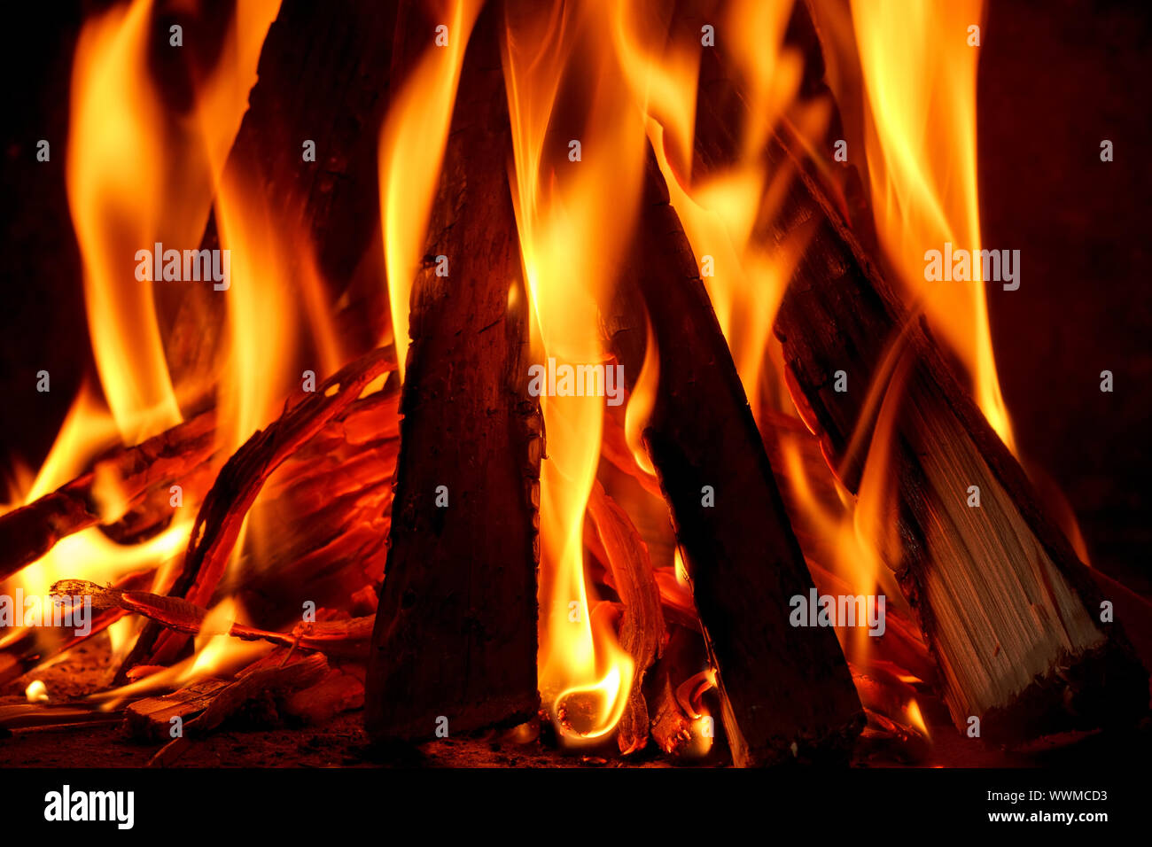 firewood burning in fireplace Stock Photo Alamy