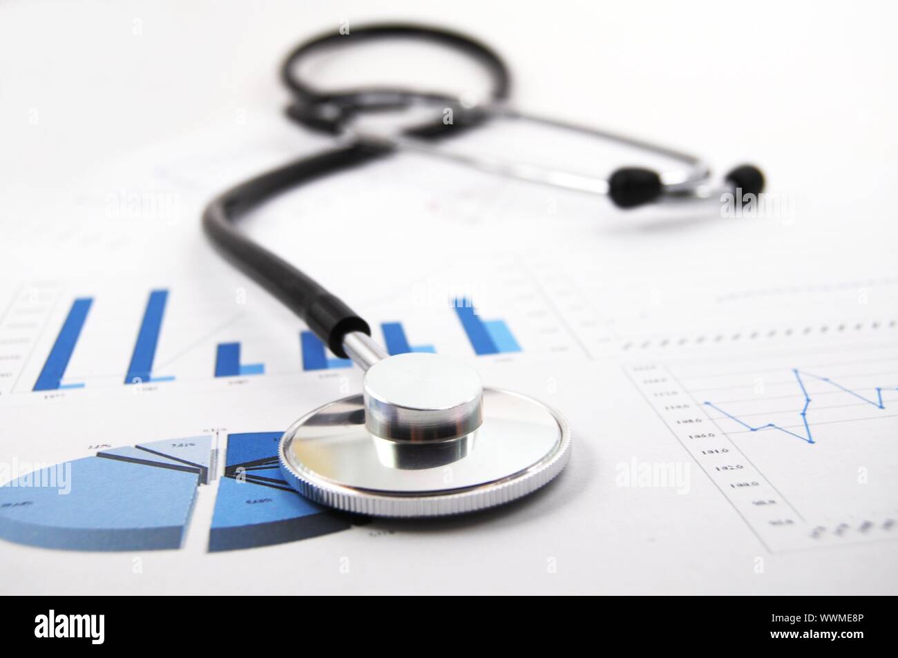 stethoscope on medical data chart in hospital Stock Photo - Alamy