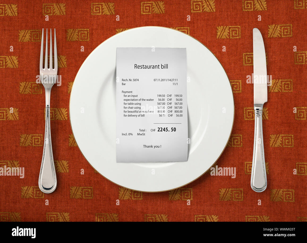 The bill on empty plate at restaurant Stock Photo