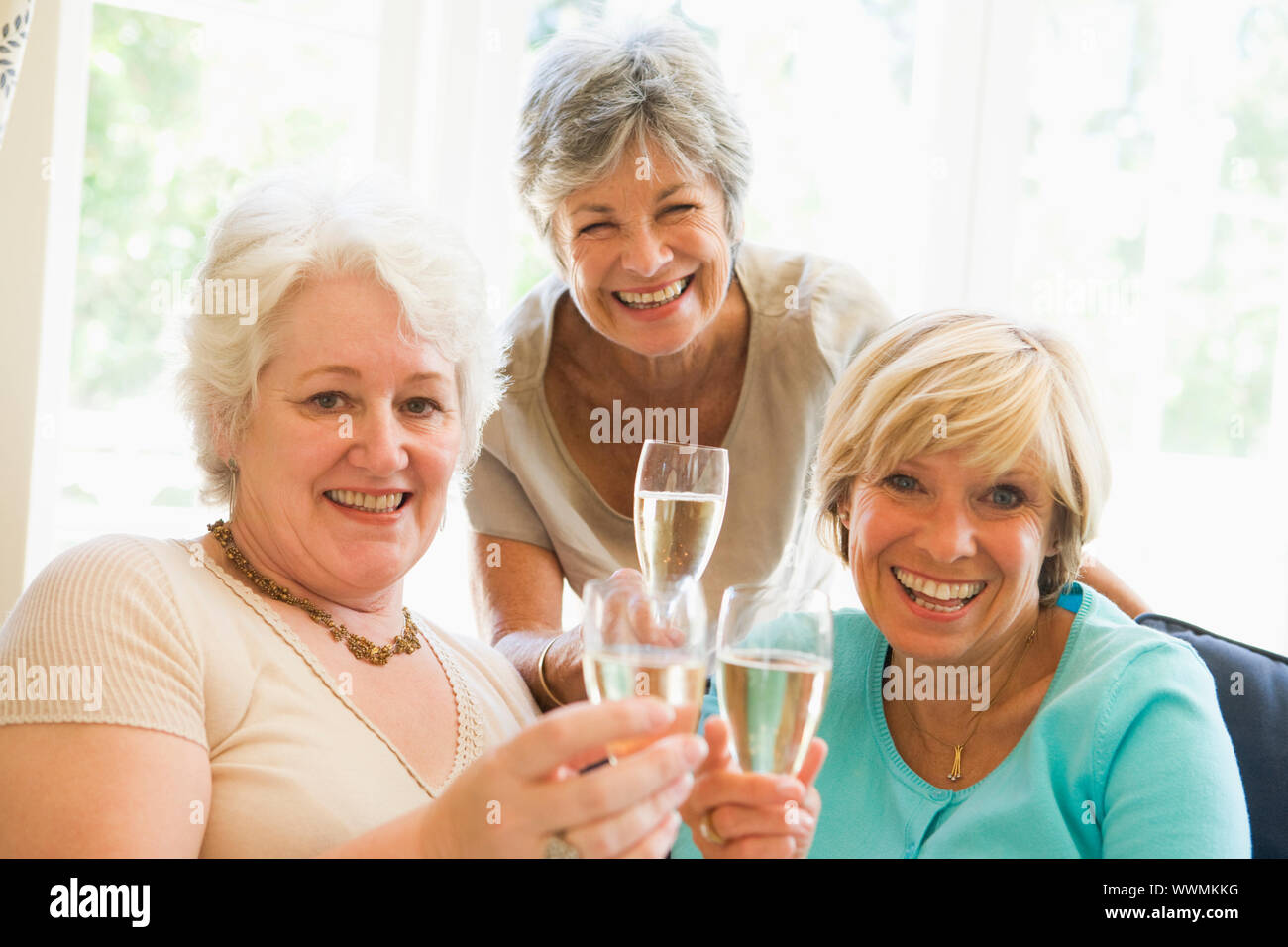 Mature women friends champagne hi-res stock photography and images - Alamy