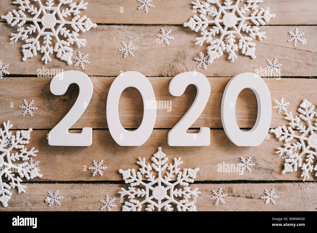 2020 New year concept on wood table and christmas decoration background. Stock Photo