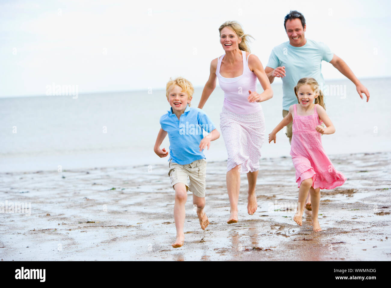 Mother son running on beach hi-res stock photography and images - Alamy