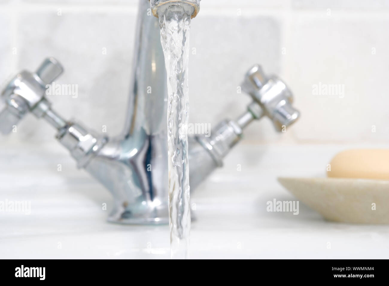Running bathroom sink Stock Photo Alamy