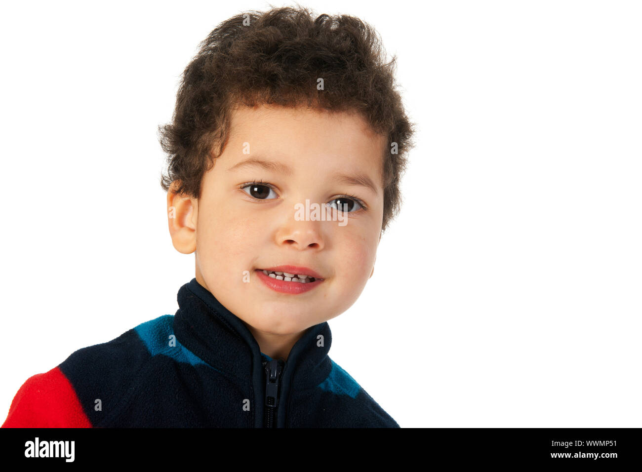 Little Boy With Black Curly Hair In The Studio Stock Photo Alamy
