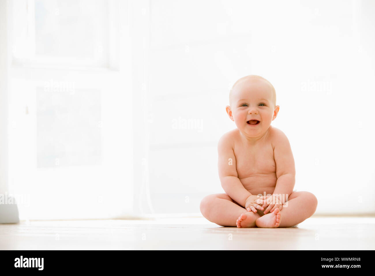 Baby with diaper sitting hi-res stock photography and images - Alamy
