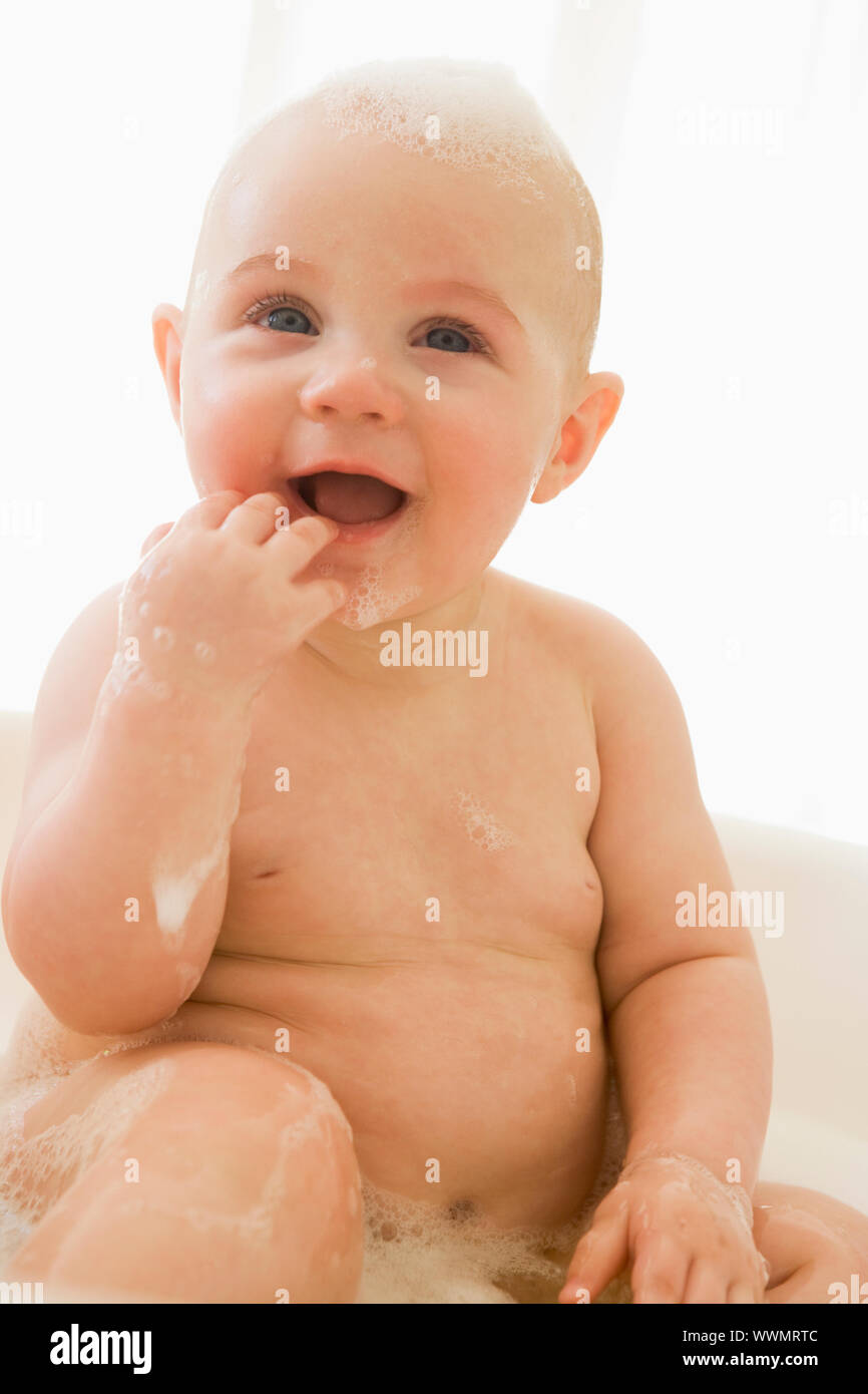 Baby in bubble bath Stock Photo Alamy