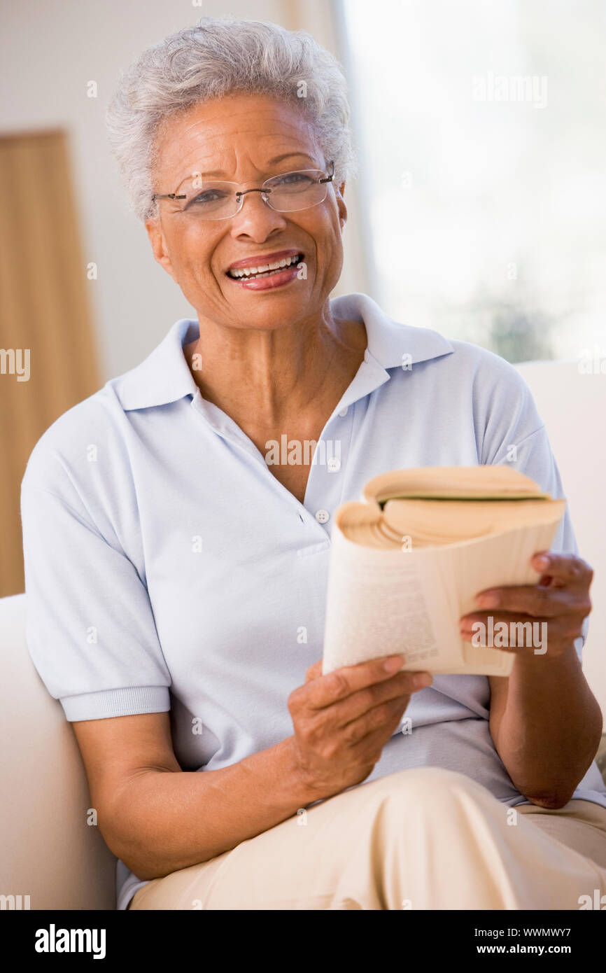African woman reading a book hi-res stock photography and images - Alamy