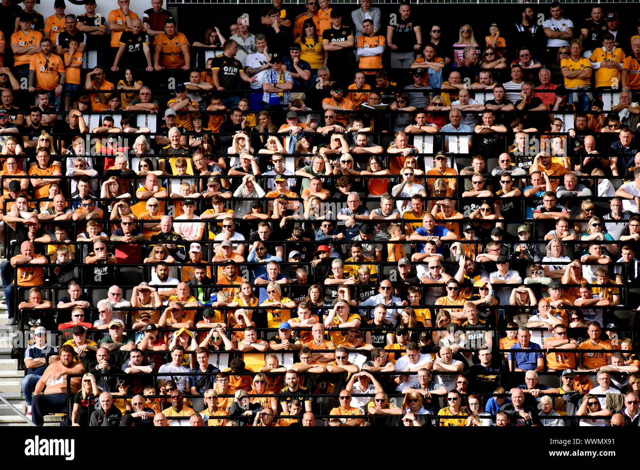 Football supporters using Safe standing seats at Molineux football stadium home of Wolverhampton Wanderers Football Club Stock Photo