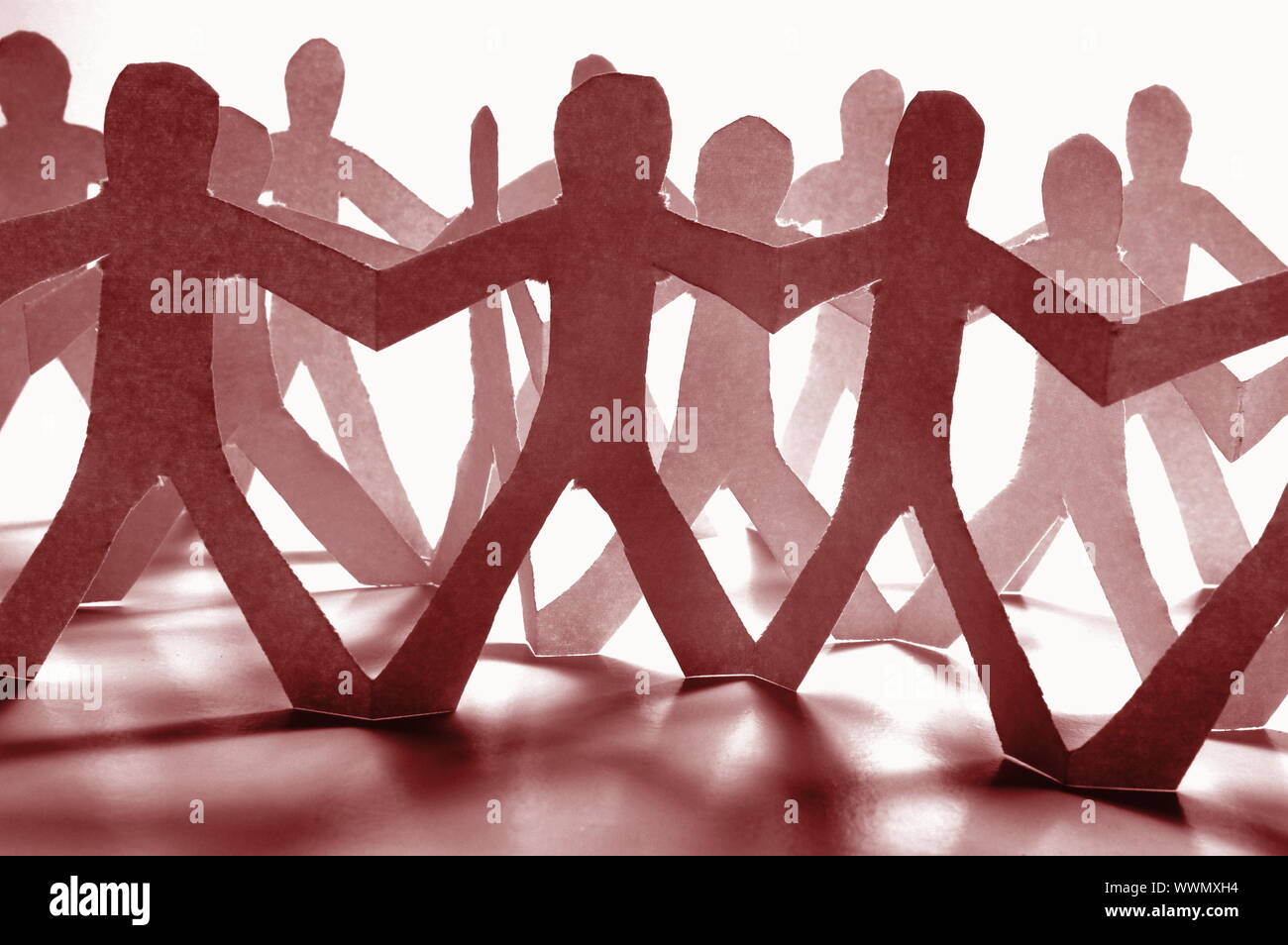 team of paper people having a party Stock Photo Alamy